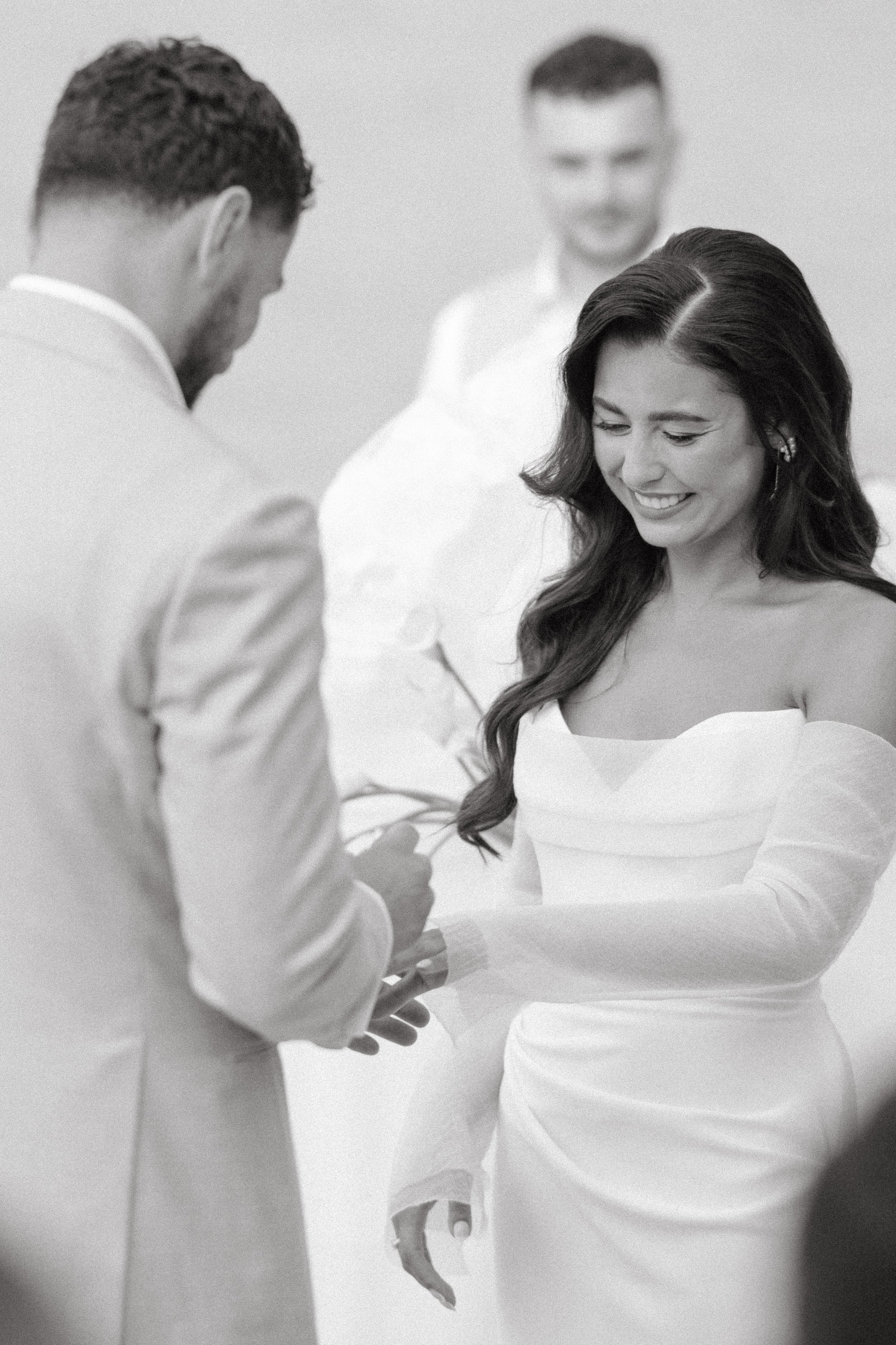 bride and groom exchanging rings during destination wedding ceremony in koh samui