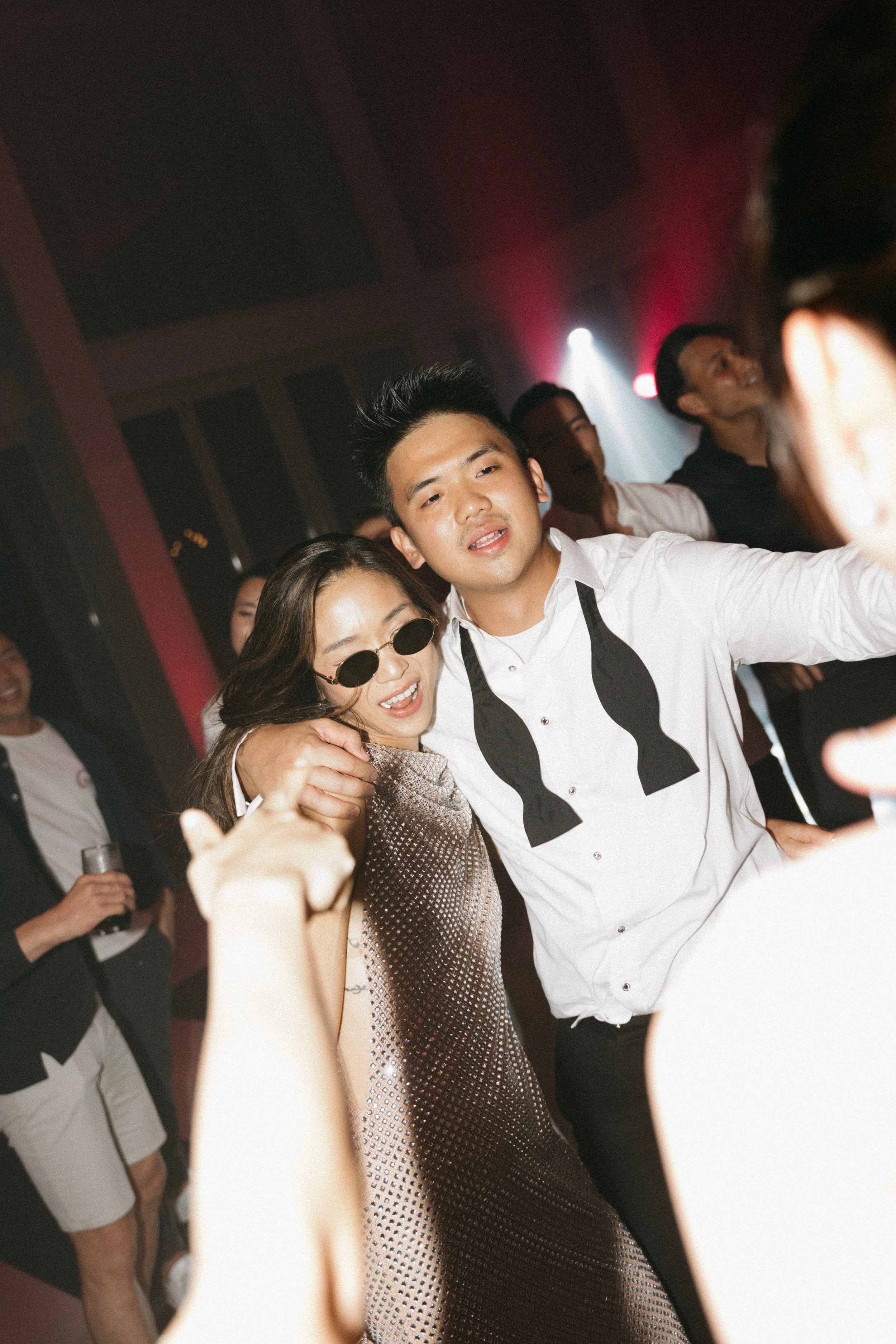action shot of bride and groom on dancefloor