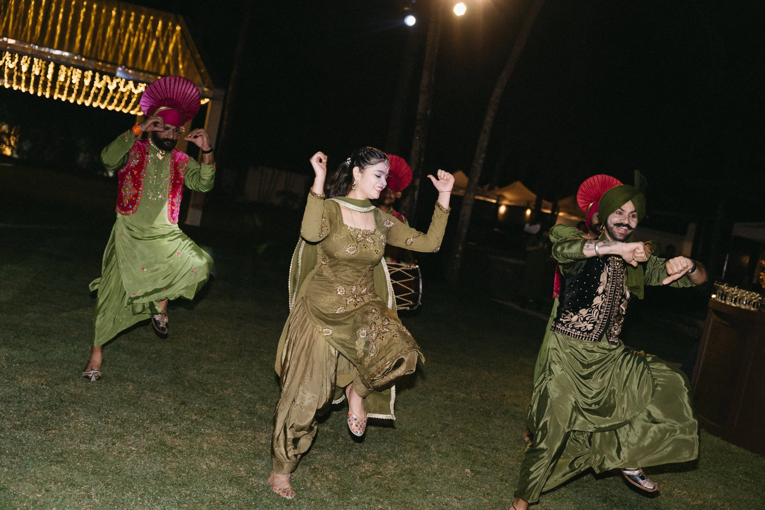 lively bhangra dance performance for wedding reception at jivana beach villas