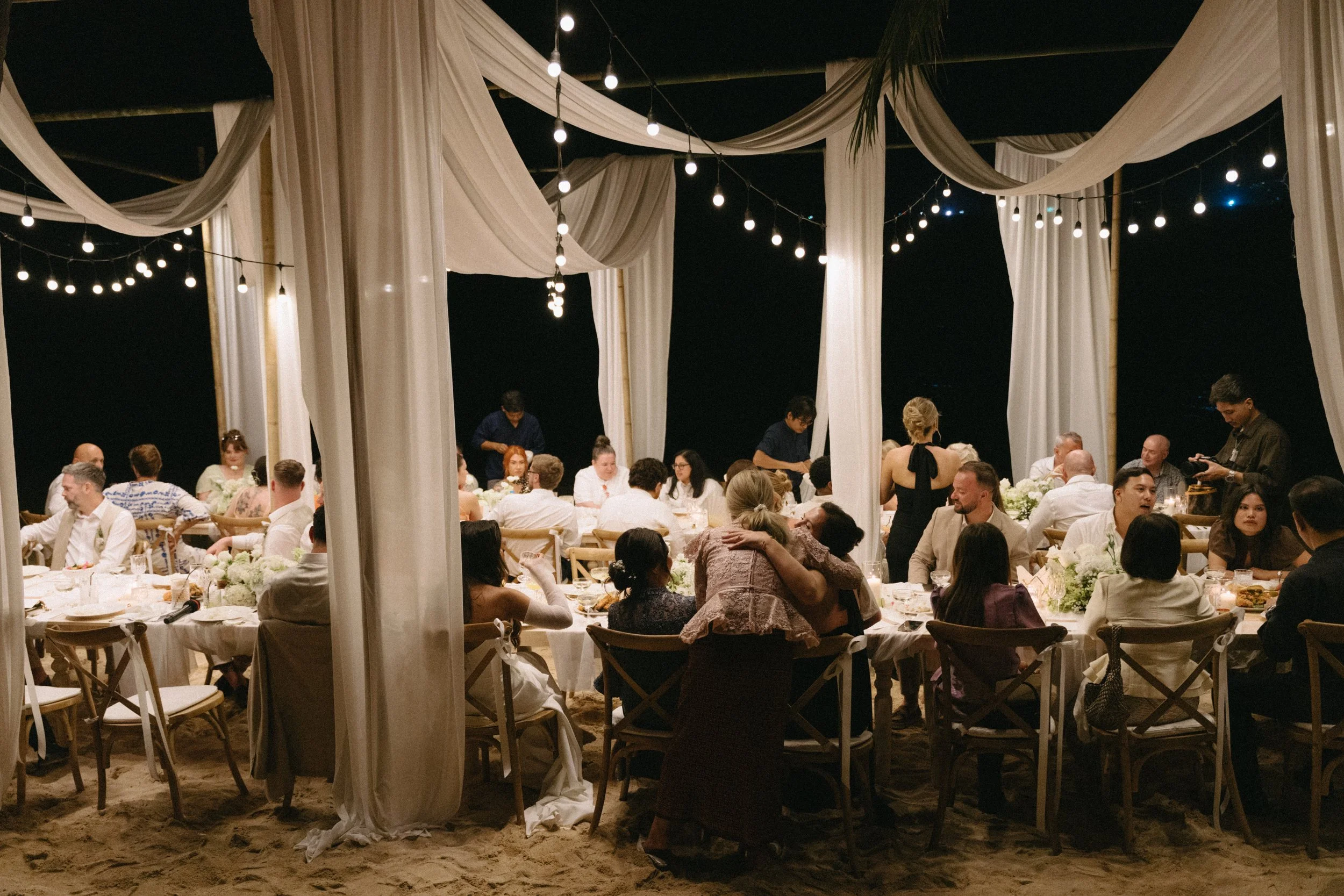 candid portrait of guests during reception on bangrak beach