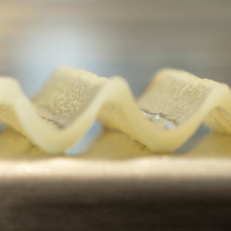 Close-up of a v-cut potato slice.