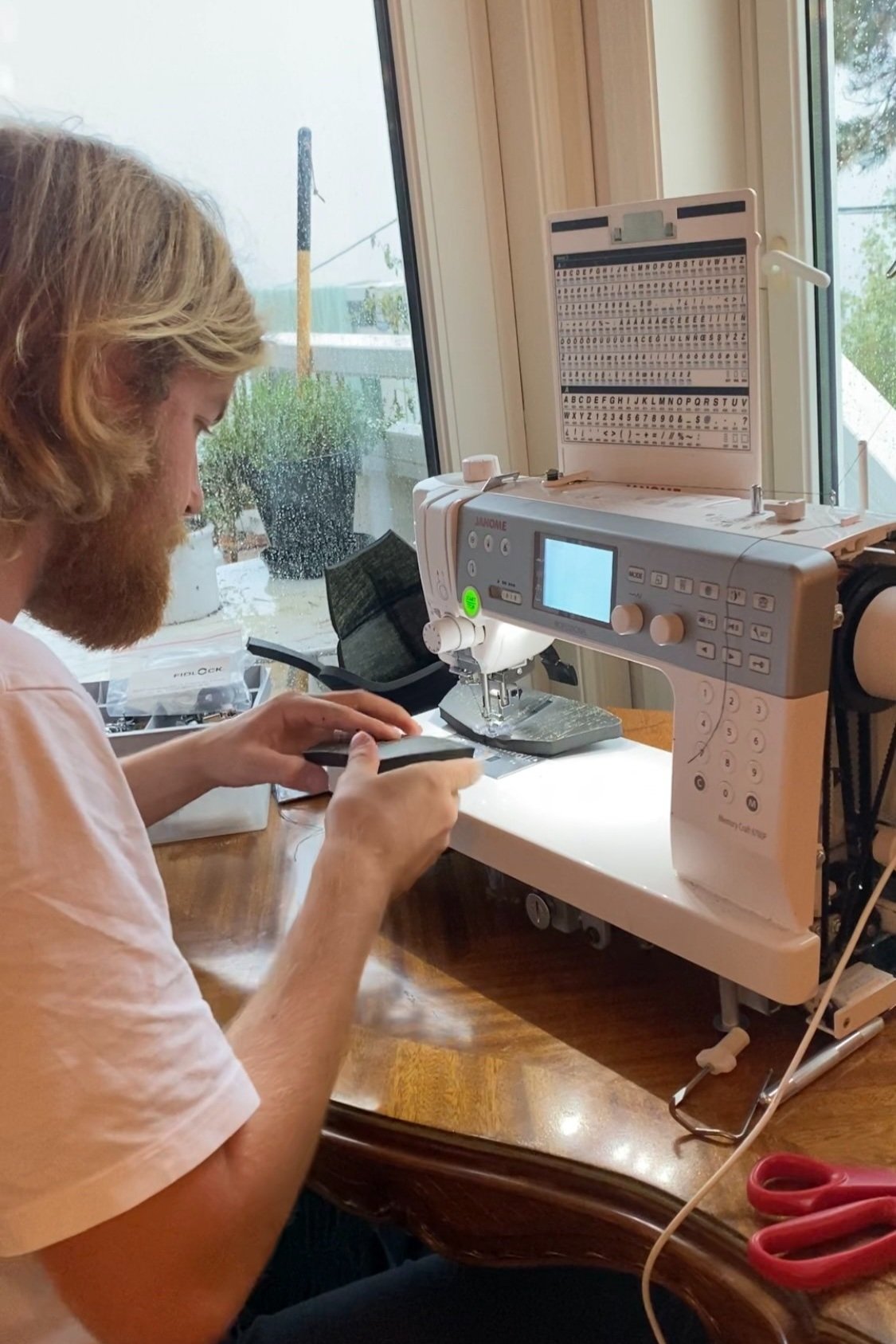 This image shows our current production in Norway where our founder Thomas Klingenberg sews the helmets