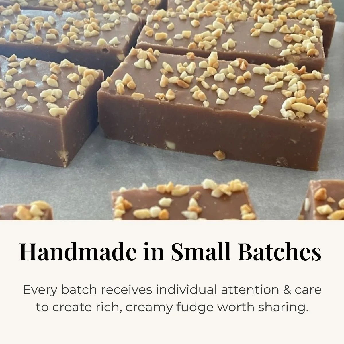 Handmade fudge topped with crushed nuts cooling in small batches on a baking tray.