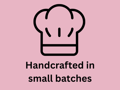 Line drawing of a chef's hat with the text 'Handcrafted in small batches' below it, on a pink background.