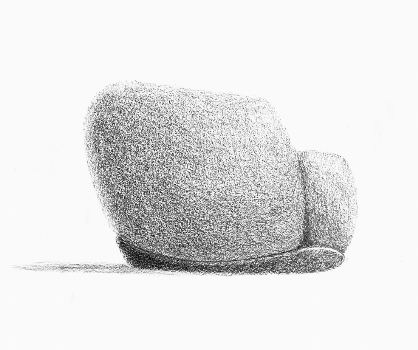 A shaded drawing of a rounded stone or pebble with a smooth surface, sitting on a flat surface.