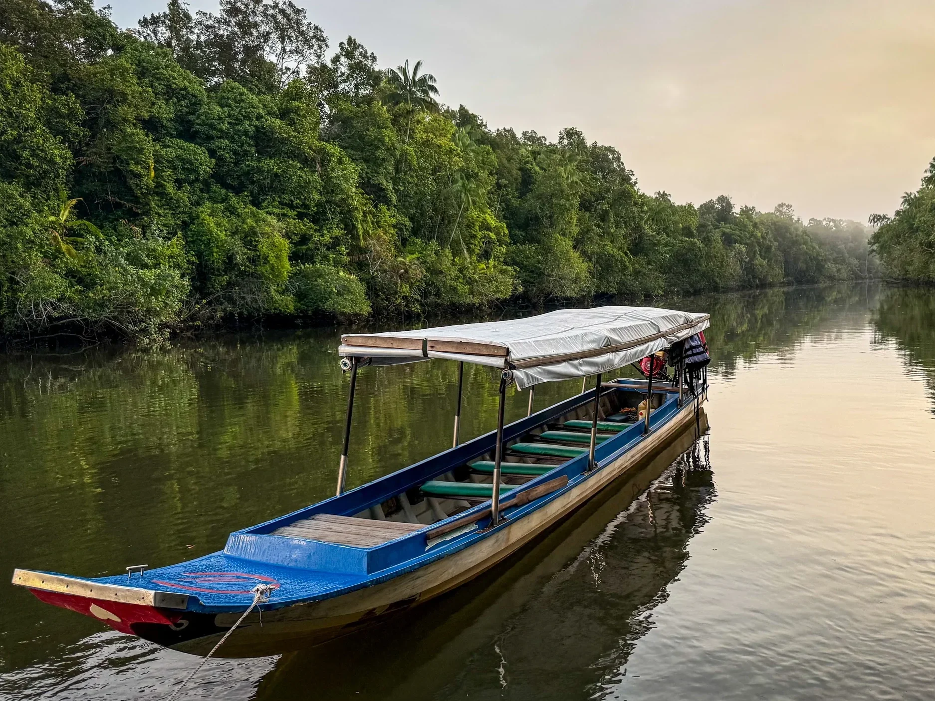 river-boat-morning-light.webp
