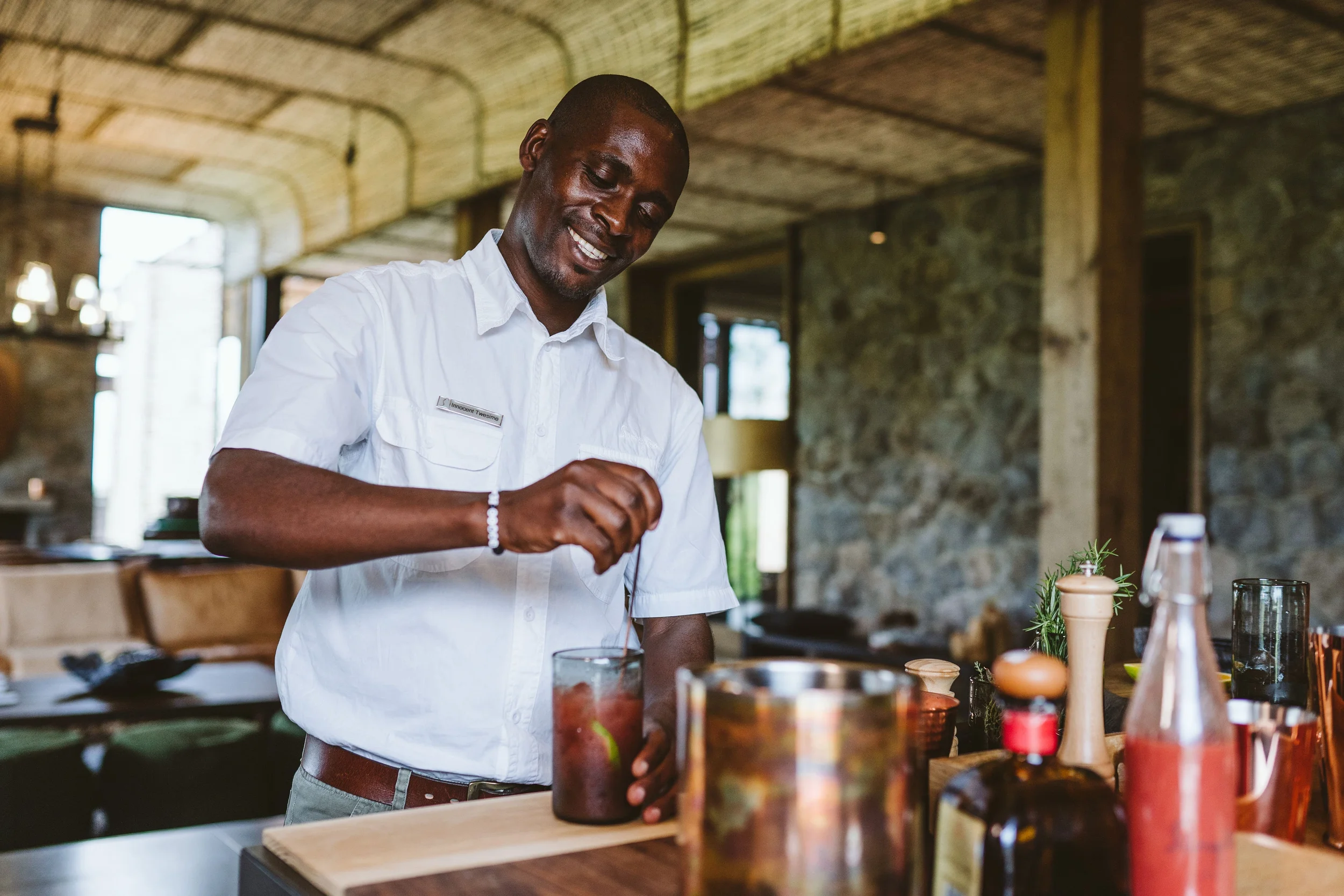 Singita Volcanoes National Park_Innocent Twesime_Drinks at Kwitonda_Blackbean.webp
