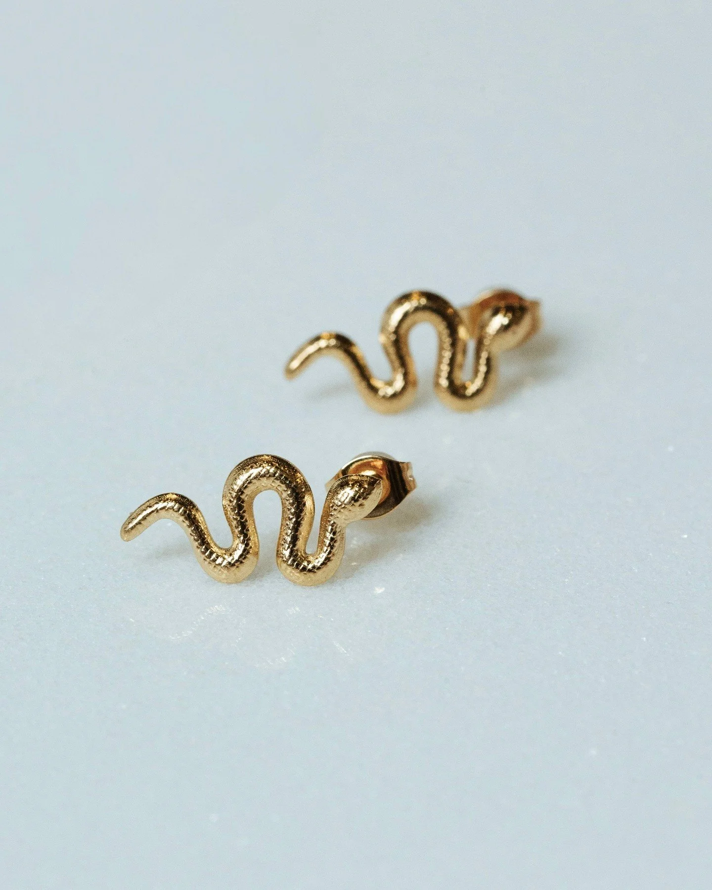 Different day, different earrings, same main-character energy.⁠
⁠
Each pair is made to live in &mdash; hypoallergenic, waterproof, and crafted with 18k gold using a PVD plating process that outlasts ordinary finishes.⁠
Translation: you can shower, sw