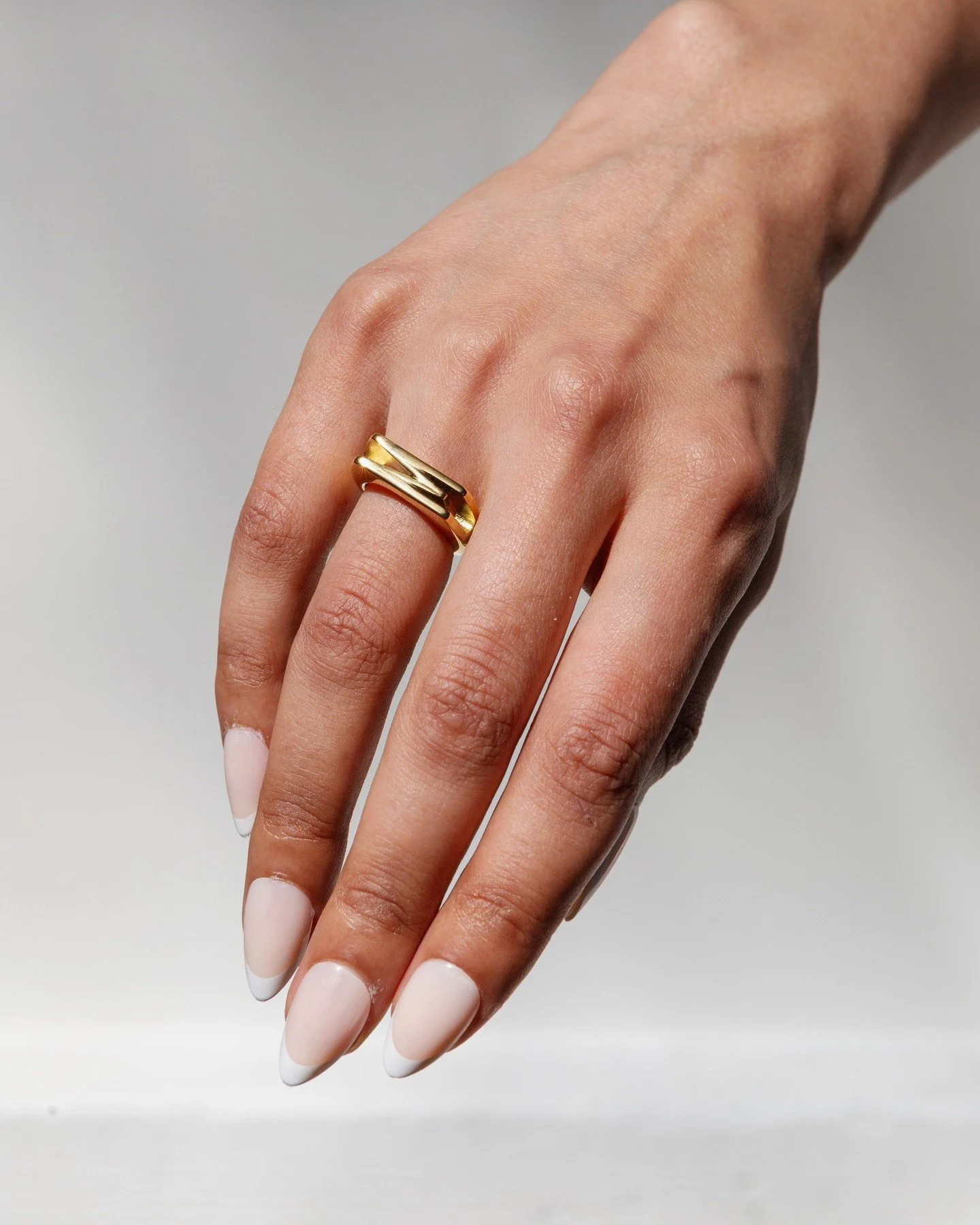 Named for the goddess of law and order, but she&rsquo;s definitely breaking a few rules.⁠
⁠
The Eunomia Ring brings structure with attitude&mdash;minimalist lines, bold edge, and a shape that refuses to sit quietly. Stack it, solo it, flex it&mdash;t
