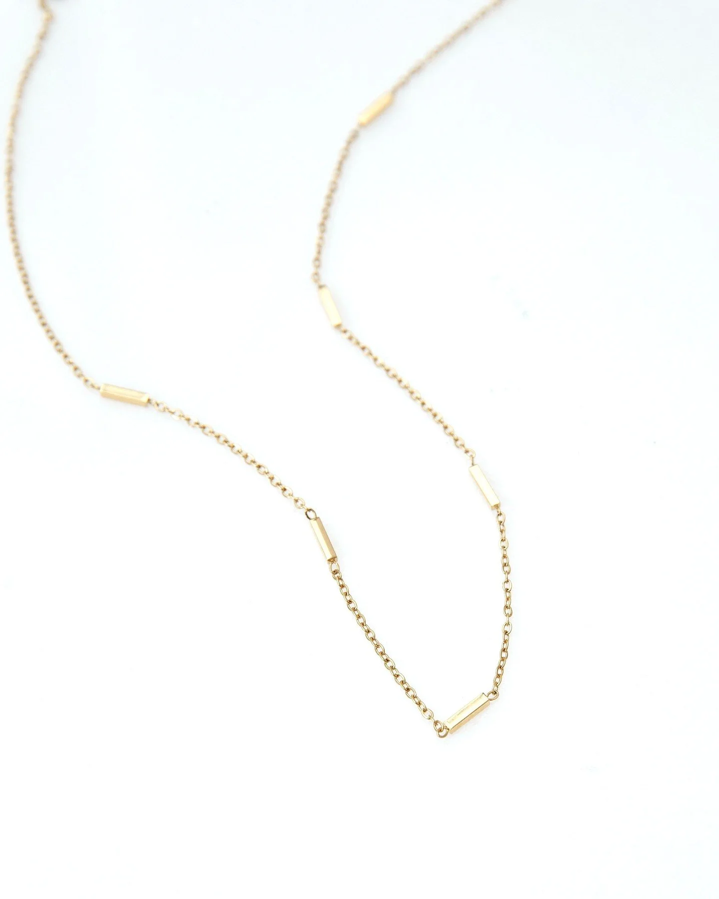 Meet Leda.⁠
A delicate chain with subtle bar accents and a golden shimmer that lingers.⁠
Feminine. Refined. Quietly dangerous.⁠
She&rsquo;s understated and far from innocent. ⁠
⁠
📸 @rxcheldenise // @messithoughtscreative⁠