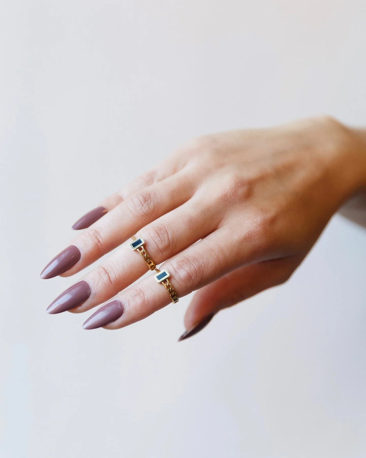 The Mania Ring is what happens when elegance stops playing it safe.⁠
A delicate gold chain silhouette meets a bold black stone &mdash; clean, intentional, and quietly dangerous.⁠
⁠
She&rsquo;s minimal, but not soft.⁠
Refined, with a pulse.⁠
⁠
Wear he