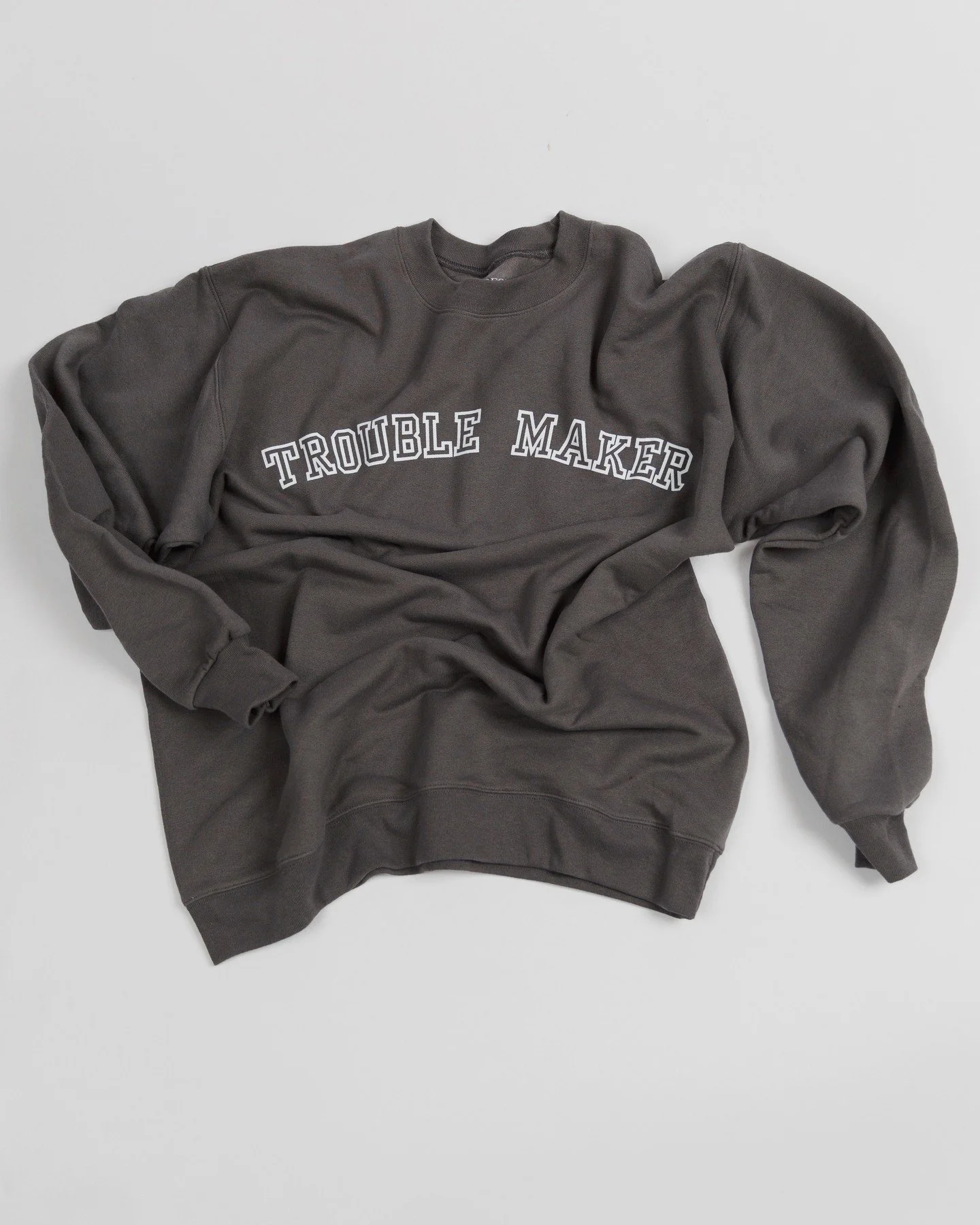 Trouble Maker.⁠
⁠
Equal parts cozy and chaotic &mdash; just how we like it.⁠
⁠
This is the unofficial uniform for stirring the pot in style. Ultra-soft, relaxed, and easy to throw on, but carrying just enough energy to live up to the name. It looks i
