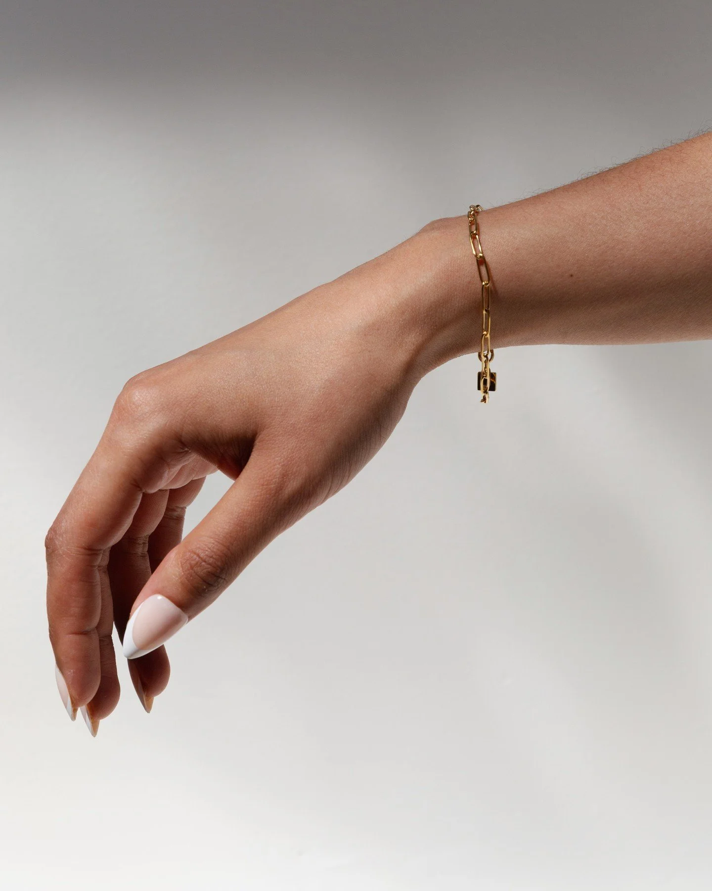 Soft name. Strong presence.⁠
⁠
Antheia brings structure to your stack with clean, modern links and a finish that catches the light just enough.⁠
⁠
Understated but never overlooked.⁠
⁠
Shop Antheia now.⁠
⁠
📸 @rxcheldenise // @messithoughtscreative⁠