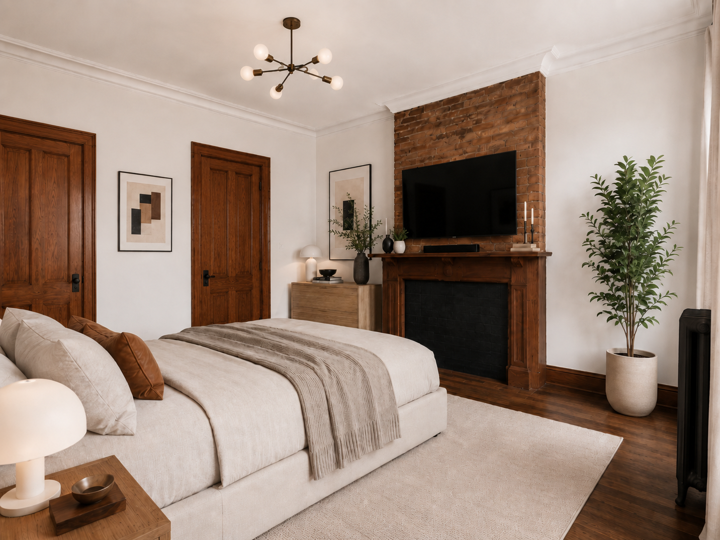 A warm NYC Brooklyn bedroom renovation by From David Designs featuring an exposed brick fireplace, restored wood trim, layered neutral textiles, modern lighting, and a refined transitional interior aesthetic.