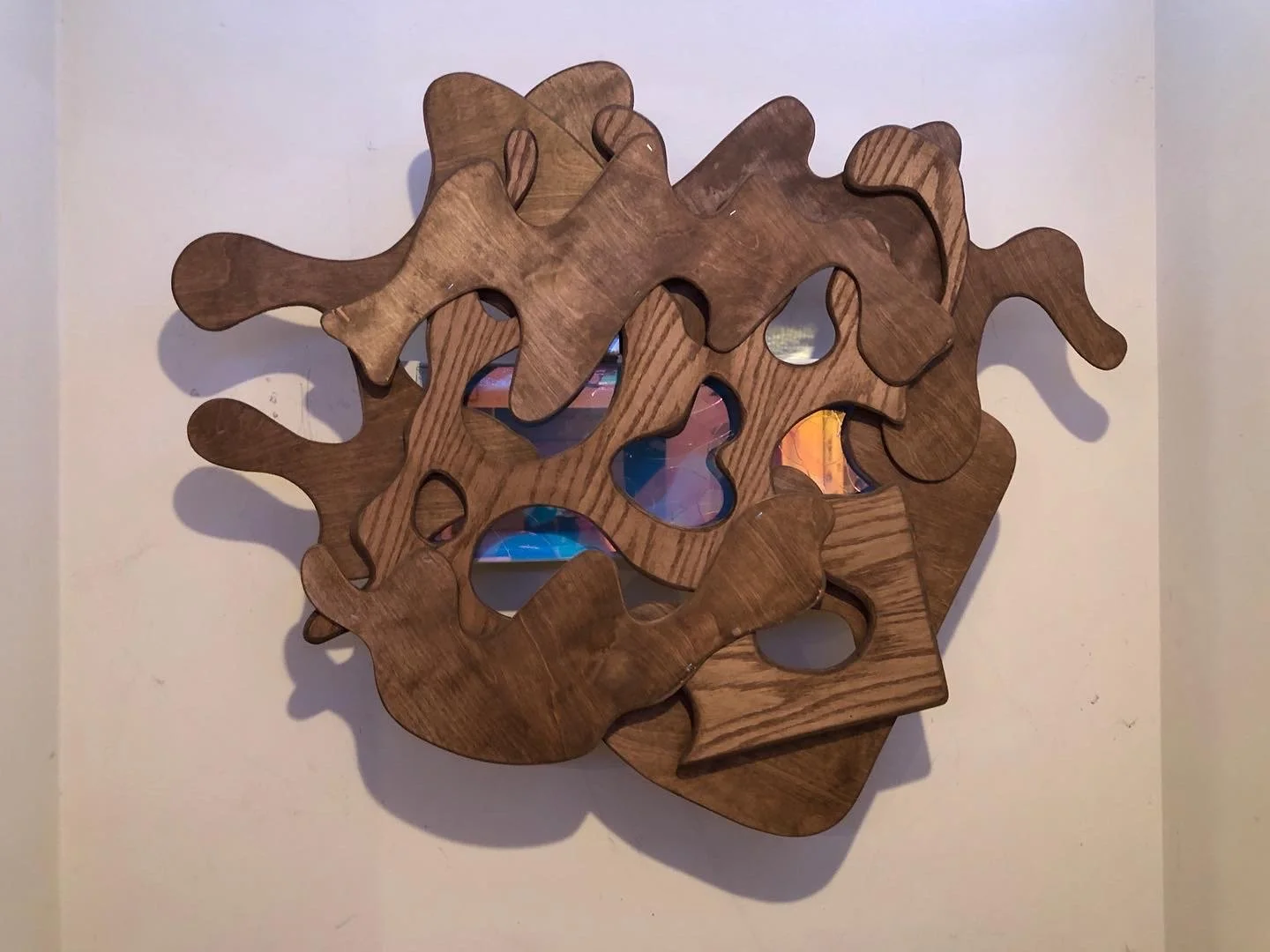 Untitled, 2022, wood, glass, and dichroic film