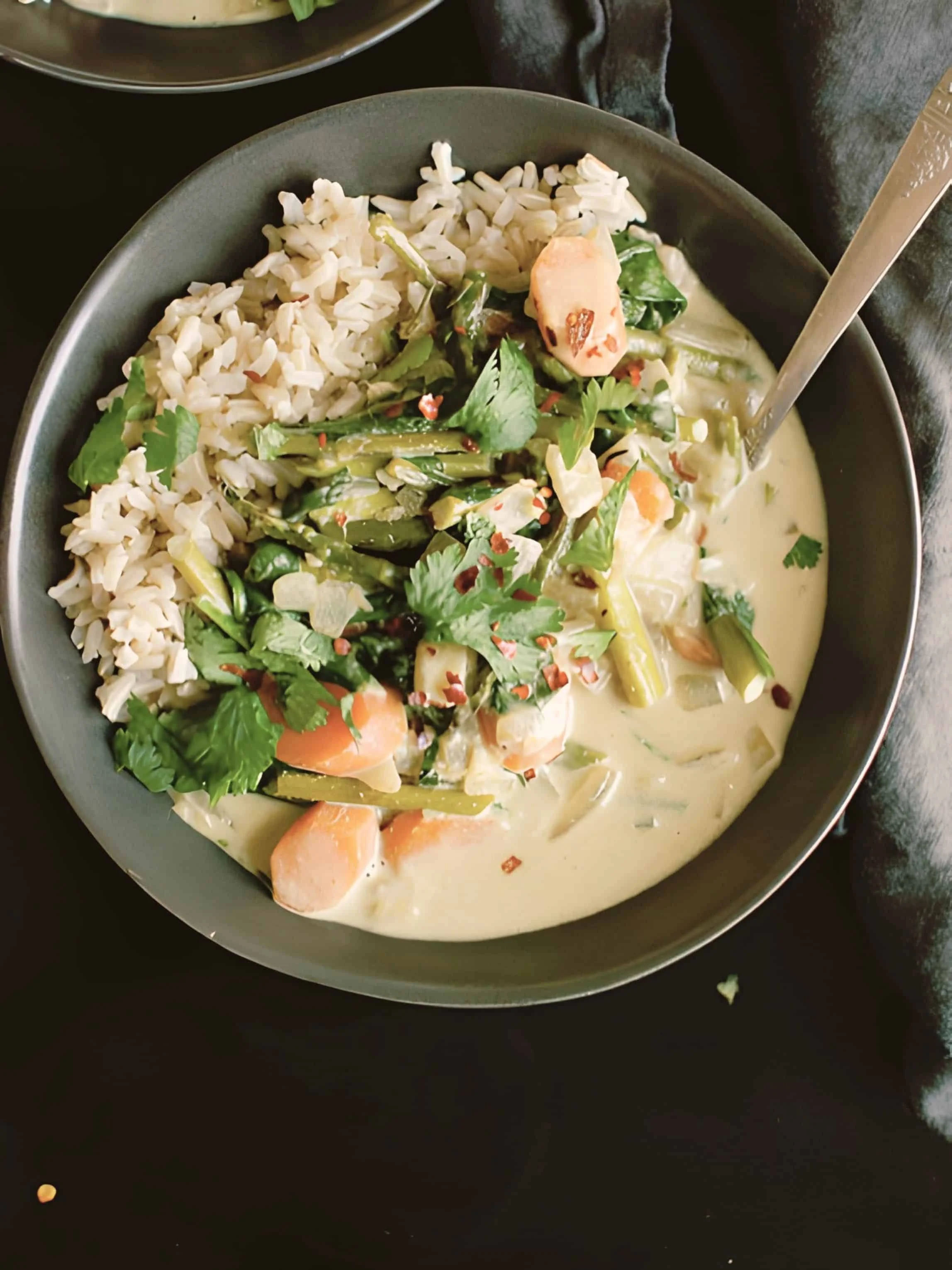 nourishing plant-based Thai green curry served for dinner at a retreat