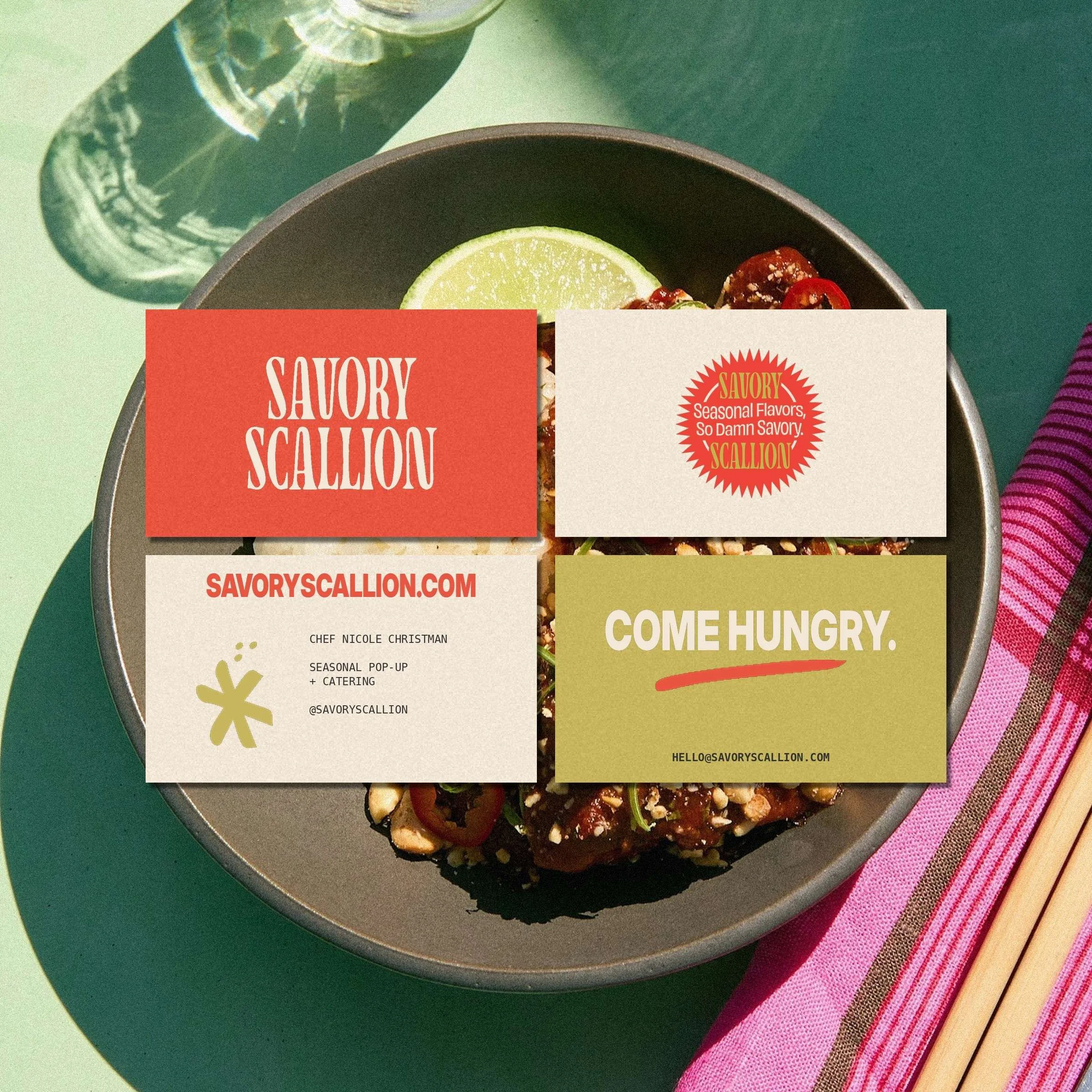 Savory Scallion business cards laid on a bowl of food