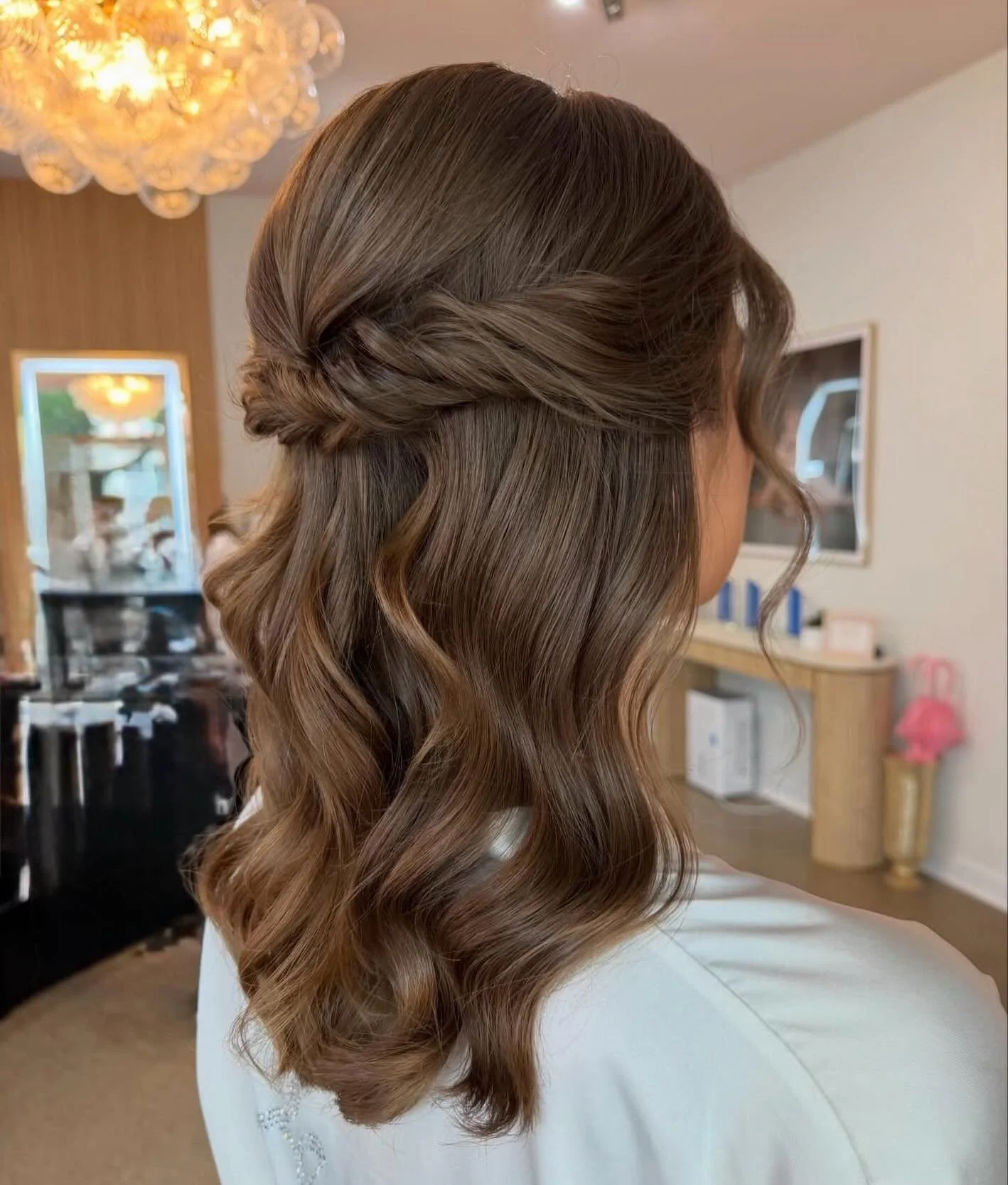 The kind of bridal hair that never goes out of style.

Soft waves, delicate face-framing pieces, and a romantic twisted half-up style create the perfect balance of elegance and effortless beauty. This is one of those looks that feels just as beautifu