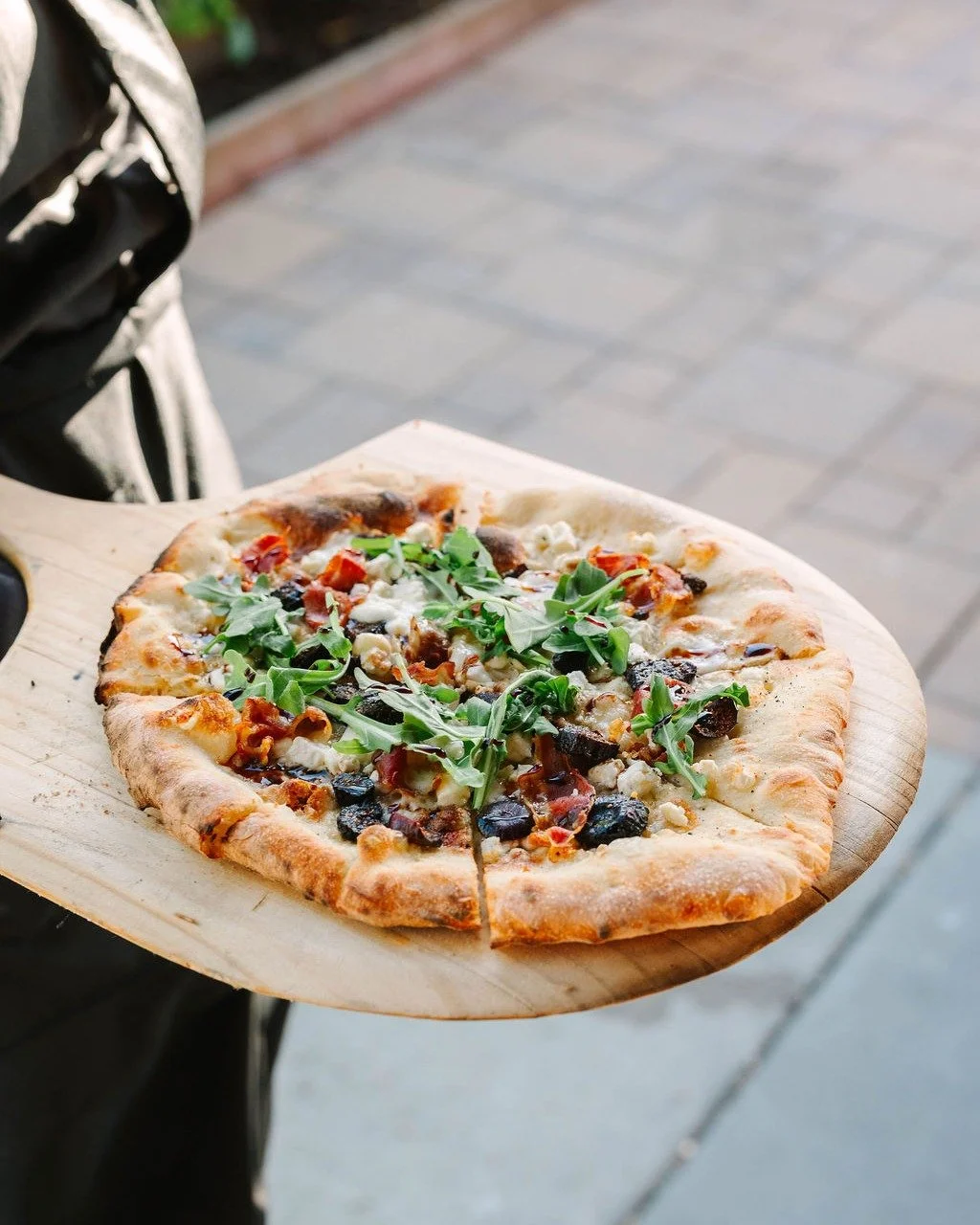 Straight from our brick oven into your hands! It's no wonder why our brick oven pizzas are a cocktail hour favorite 🍕

Photo @amyjordan_photo 
Planning @joyfullygathered 
Venue @viansawinery 
 
#brickovenpizza #winecountrywedding #eventcatering #bay