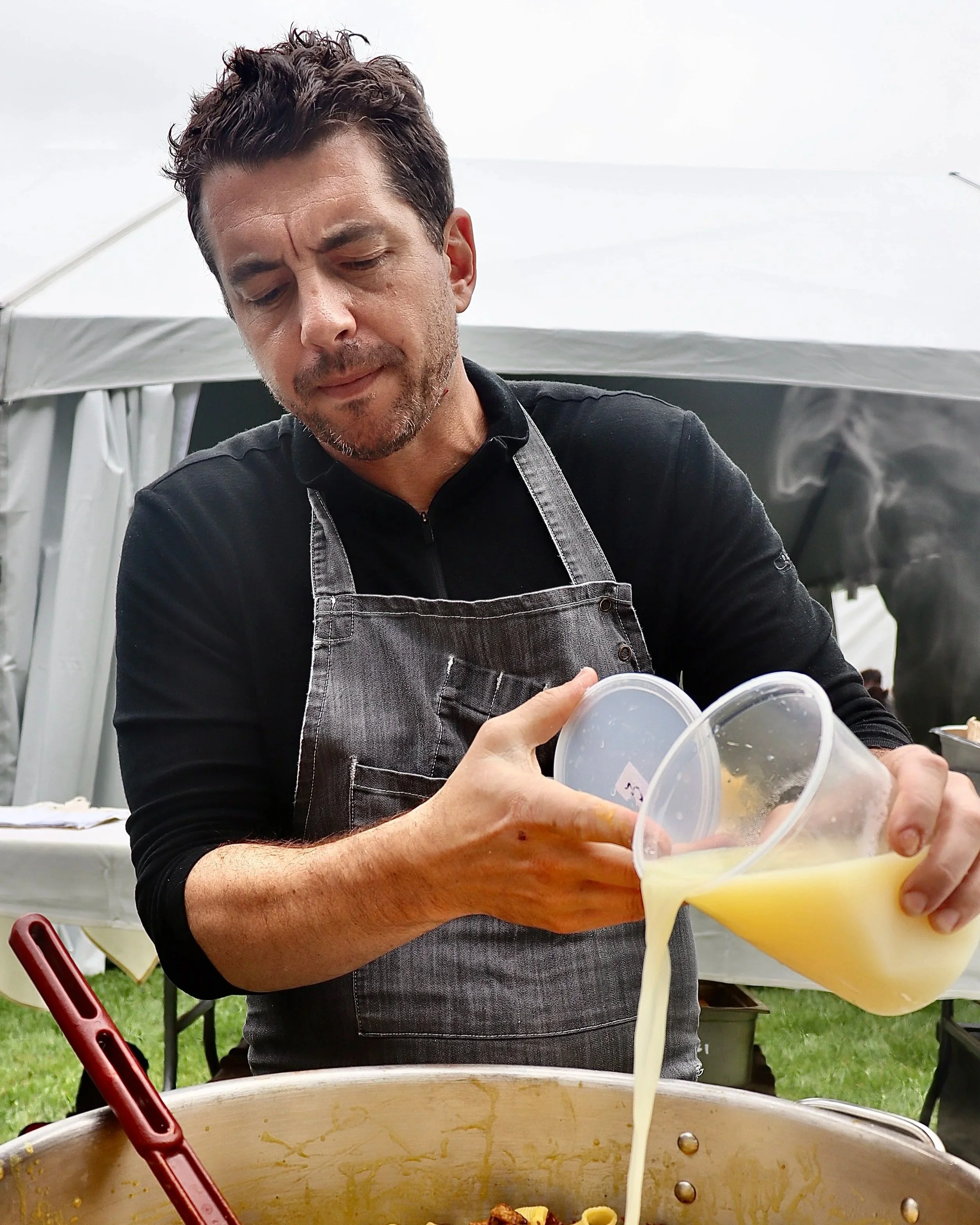 Ari cooking on site.