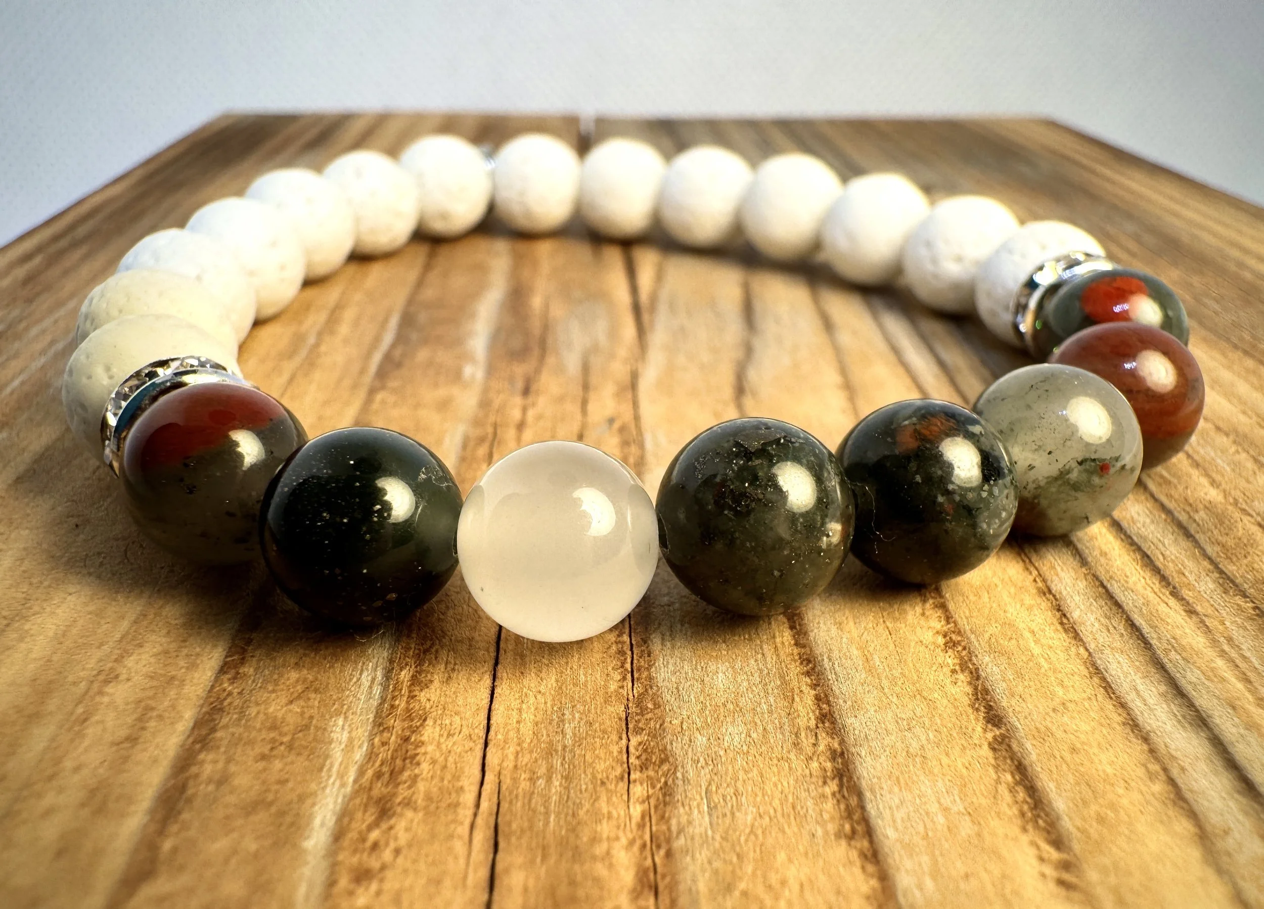 “Bloodstone strength and revitalizing energy bracelet handmade in Niagara Falls, Canada by PeaceTree1111.” Protection Bracelet with intention.