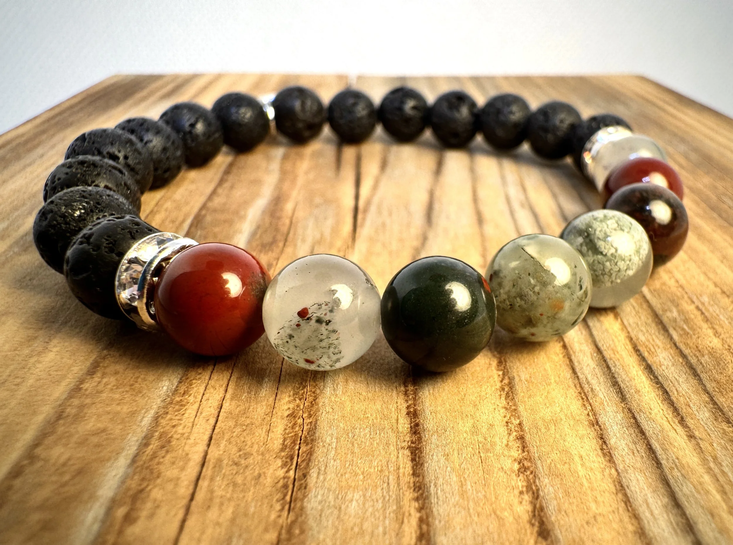 “Bloodstone strength and revitalizing energy bracelet handmade in Niagara Falls, Canada by PeaceTree1111.” Protection Bracelet with intention.