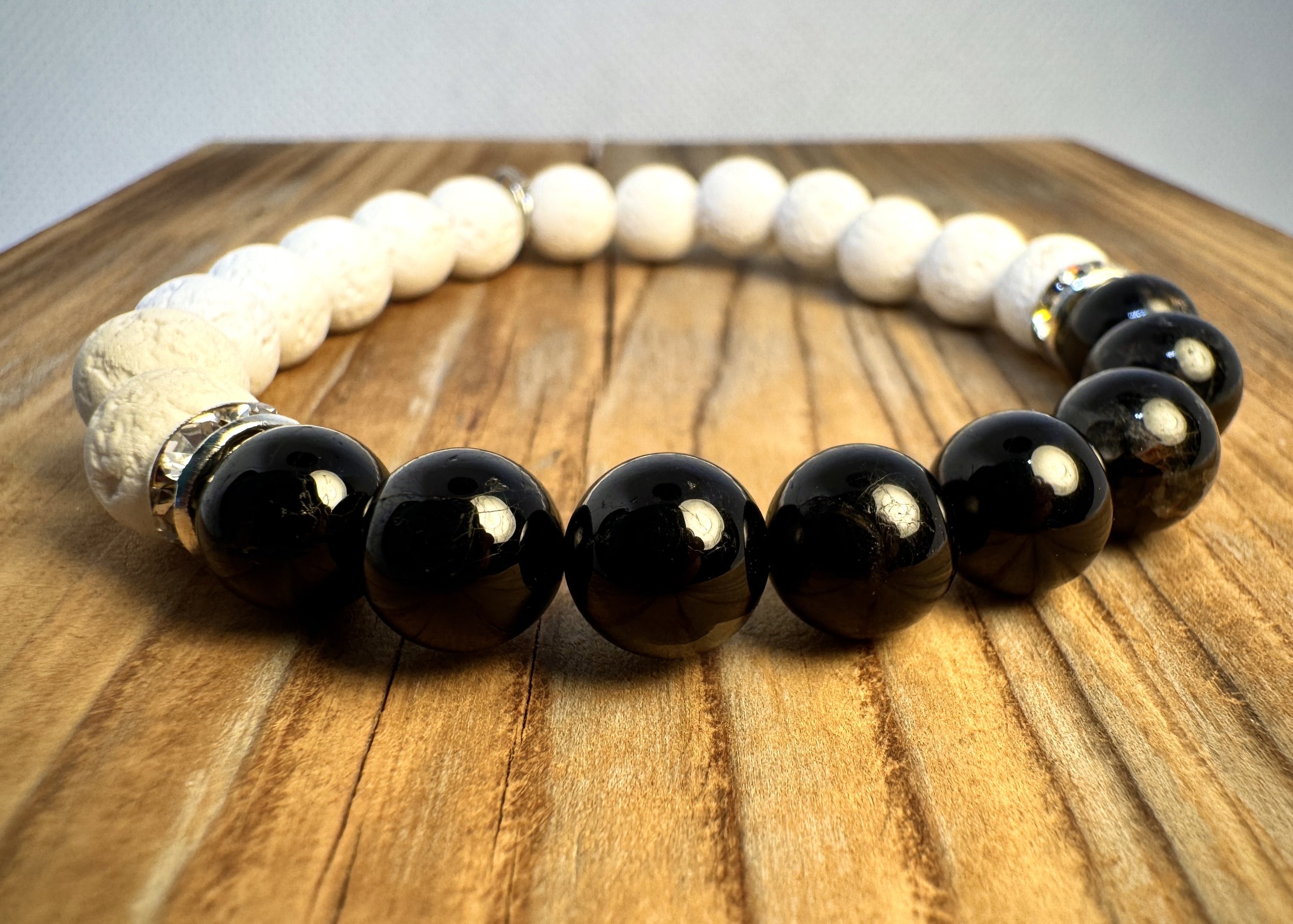 “Black Tourmaline protection and grounding gemstone bracelet handmade in Niagara Falls, Canada by PeaceTree1111.” Protection Bracelet with intention.
