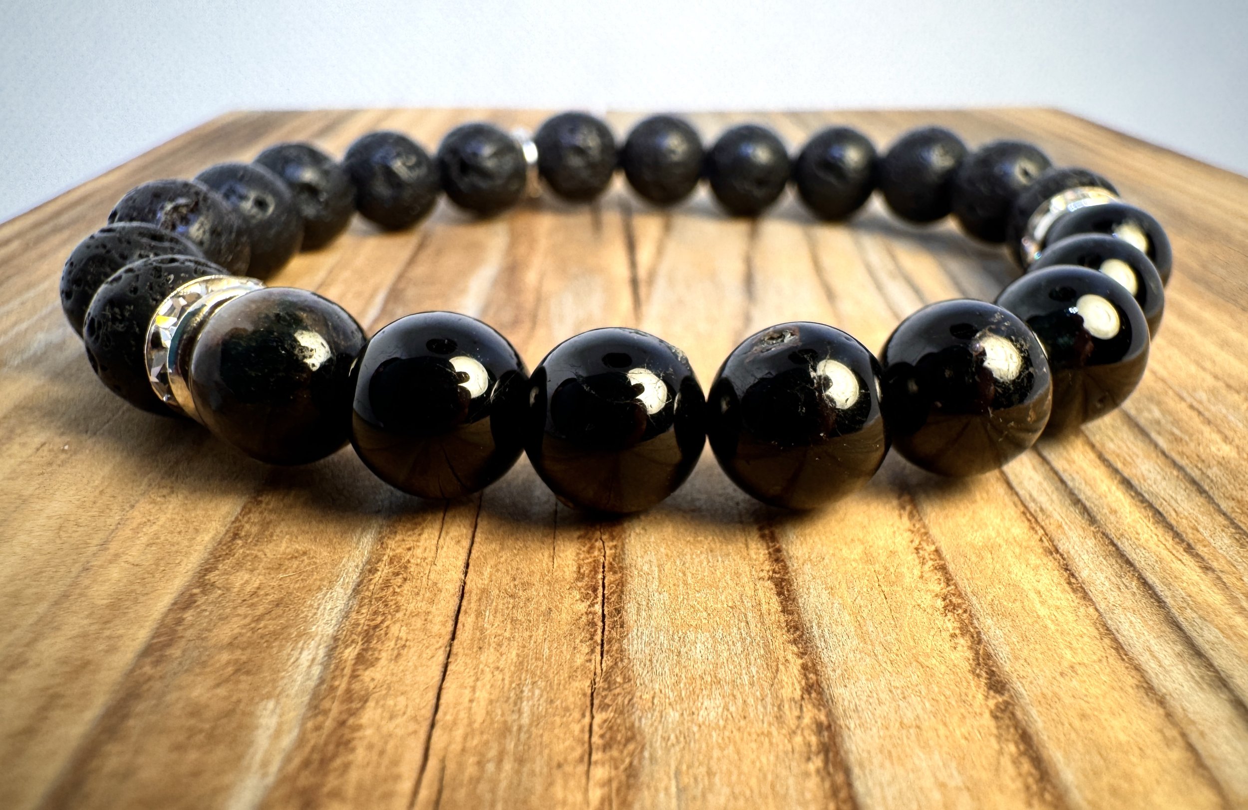 “Black Tourmaline protection and grounding gemstone bracelet handmade in Niagara Falls, Canada by PeaceTree1111.” Protection Bracelet with intention.