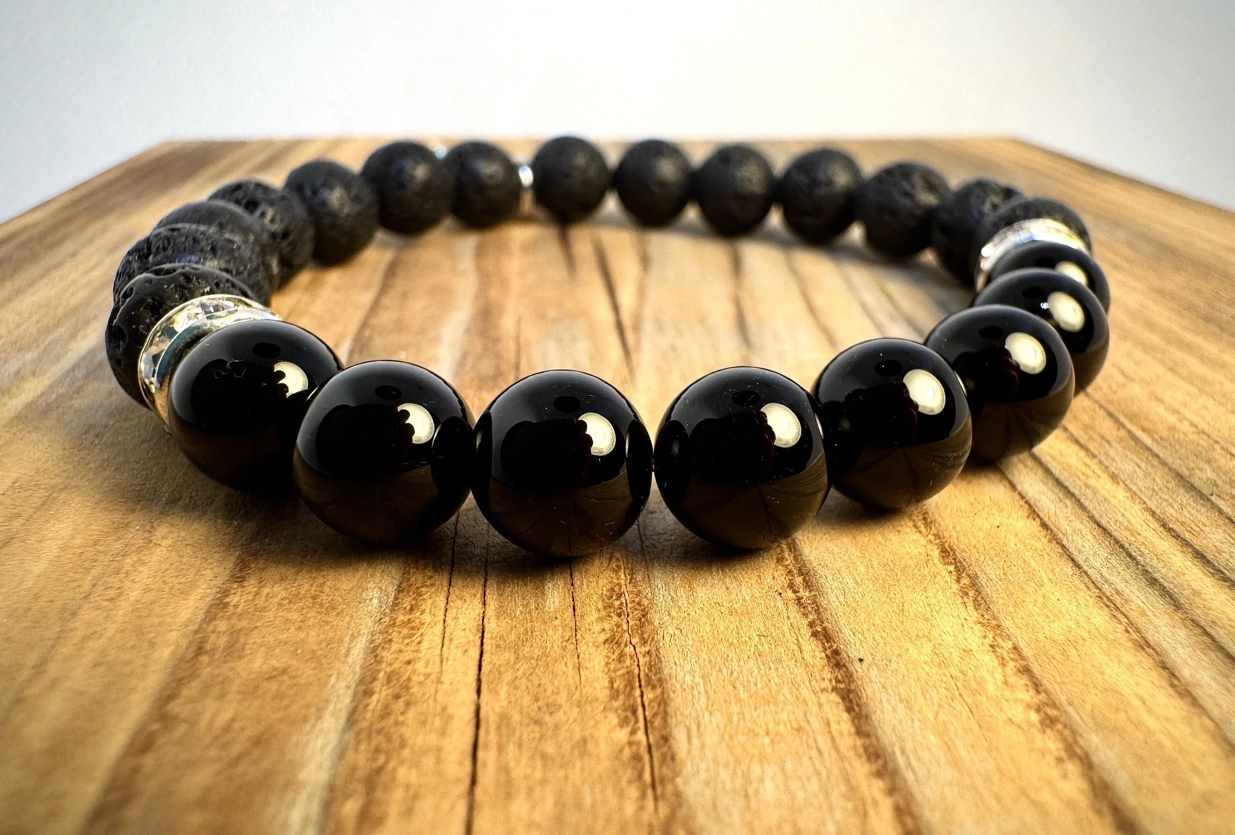 “Onyx grounding and protective gemstone bracelet handmade in Niagara Falls, Canada by PeaceTree.” Protection Bracelet with intention.