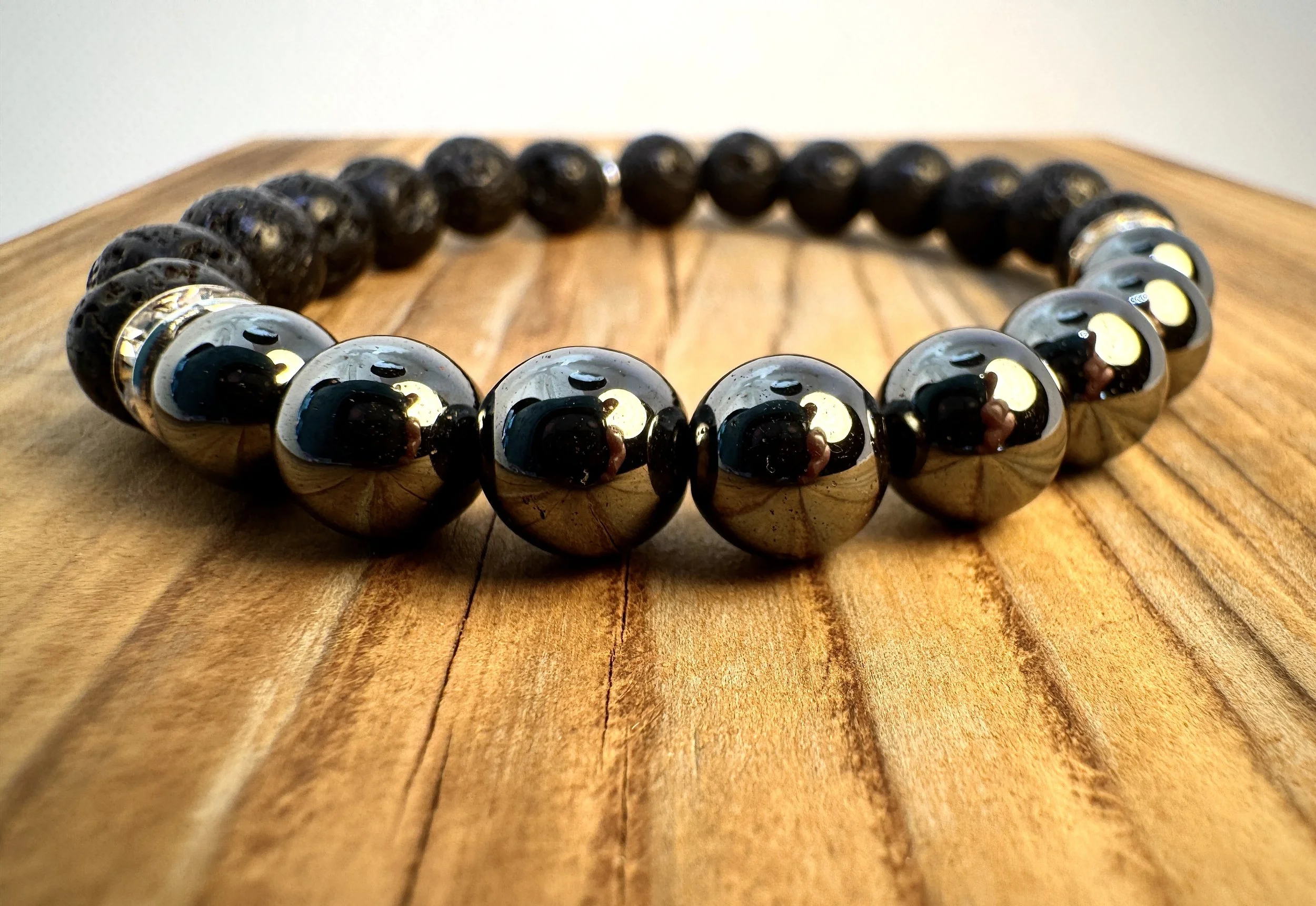“Hematite grounding and protective gemstone bracelet handmade in Niagara Falls, Canada by PeaceTree1111.” Protection Bracelet with intention.