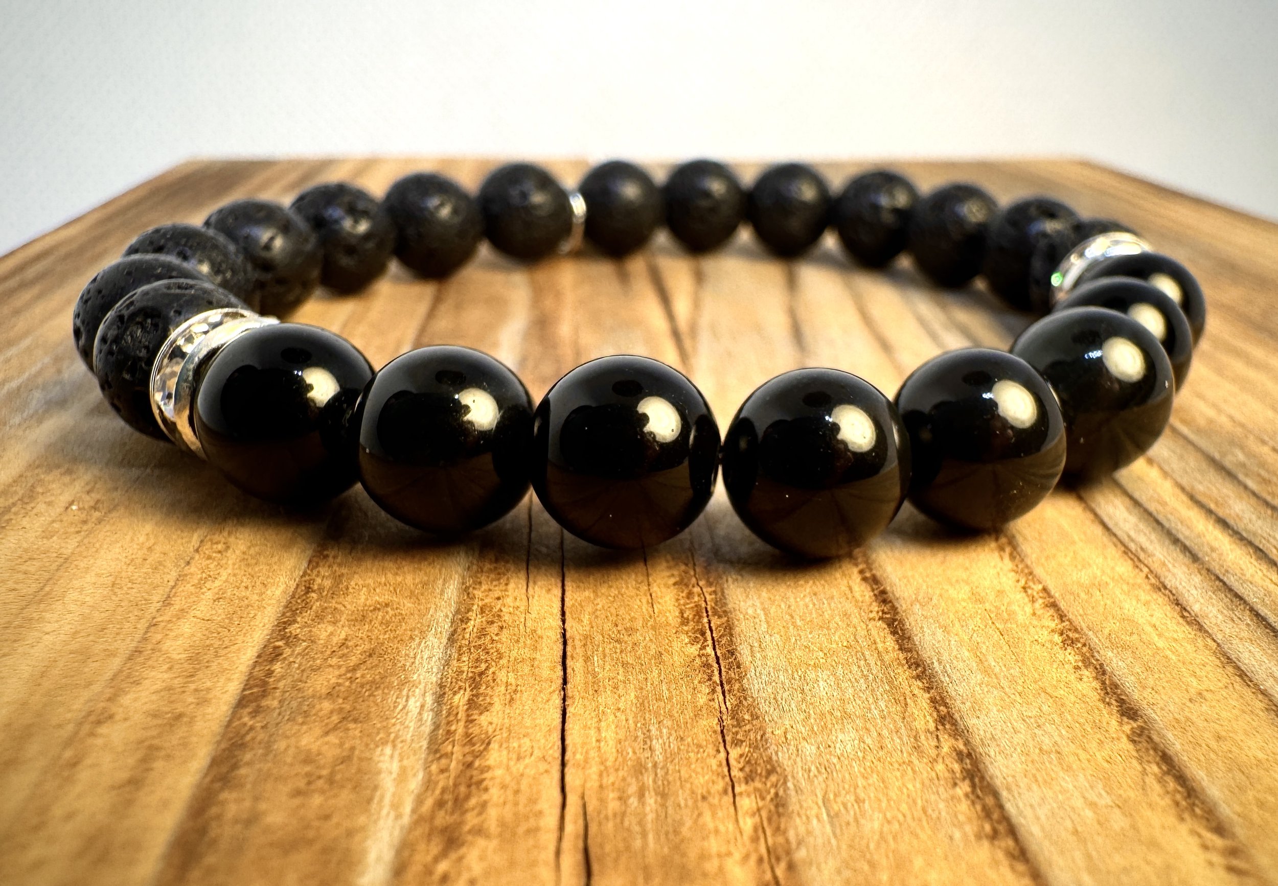 “Obsidian protection and deep grounding gemstone bracelet handmade in Niagara Falls, Canada by PeaceTree.” Protection Bracelet with intetion.