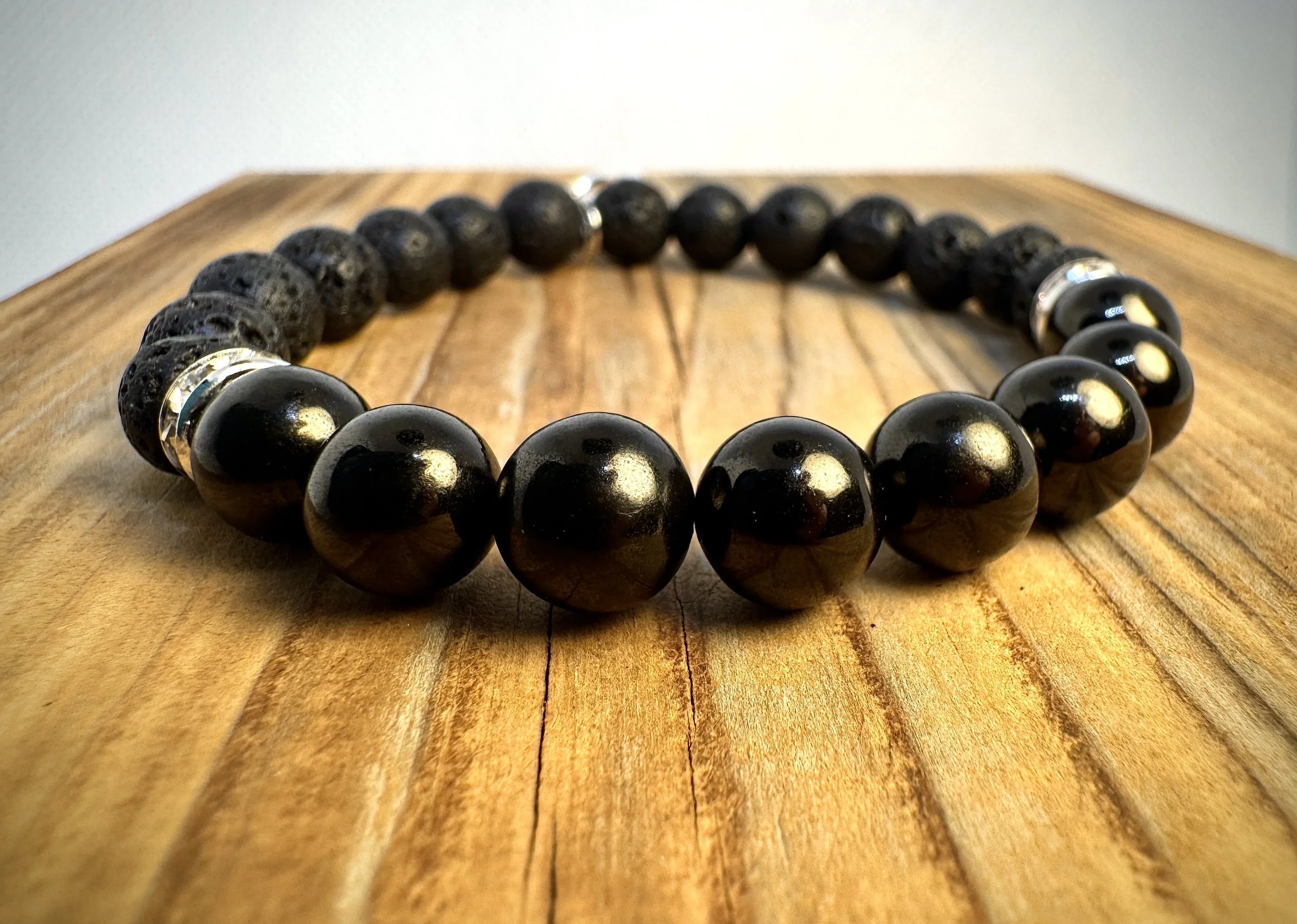 “Jet deep protection and energetic cleansing bracelet handmade in Niagara Falls, Canada by PeaceTree.” Protection Bracelet with intention.