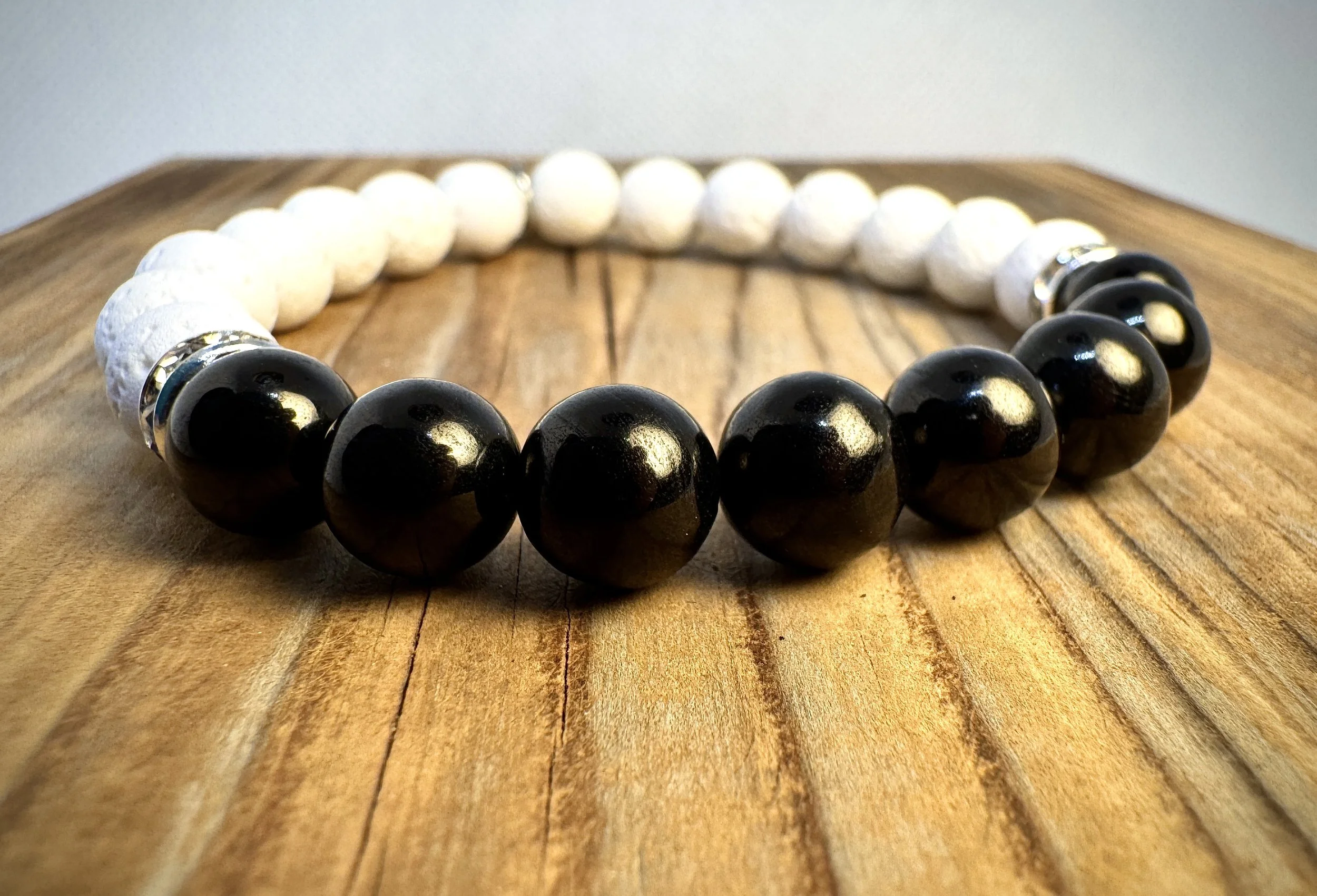 “Jet deep protection and energetic cleansing bracelet handmade in Niagara Falls, Canada by PeaceTree.” Protection Bracelet with intention.