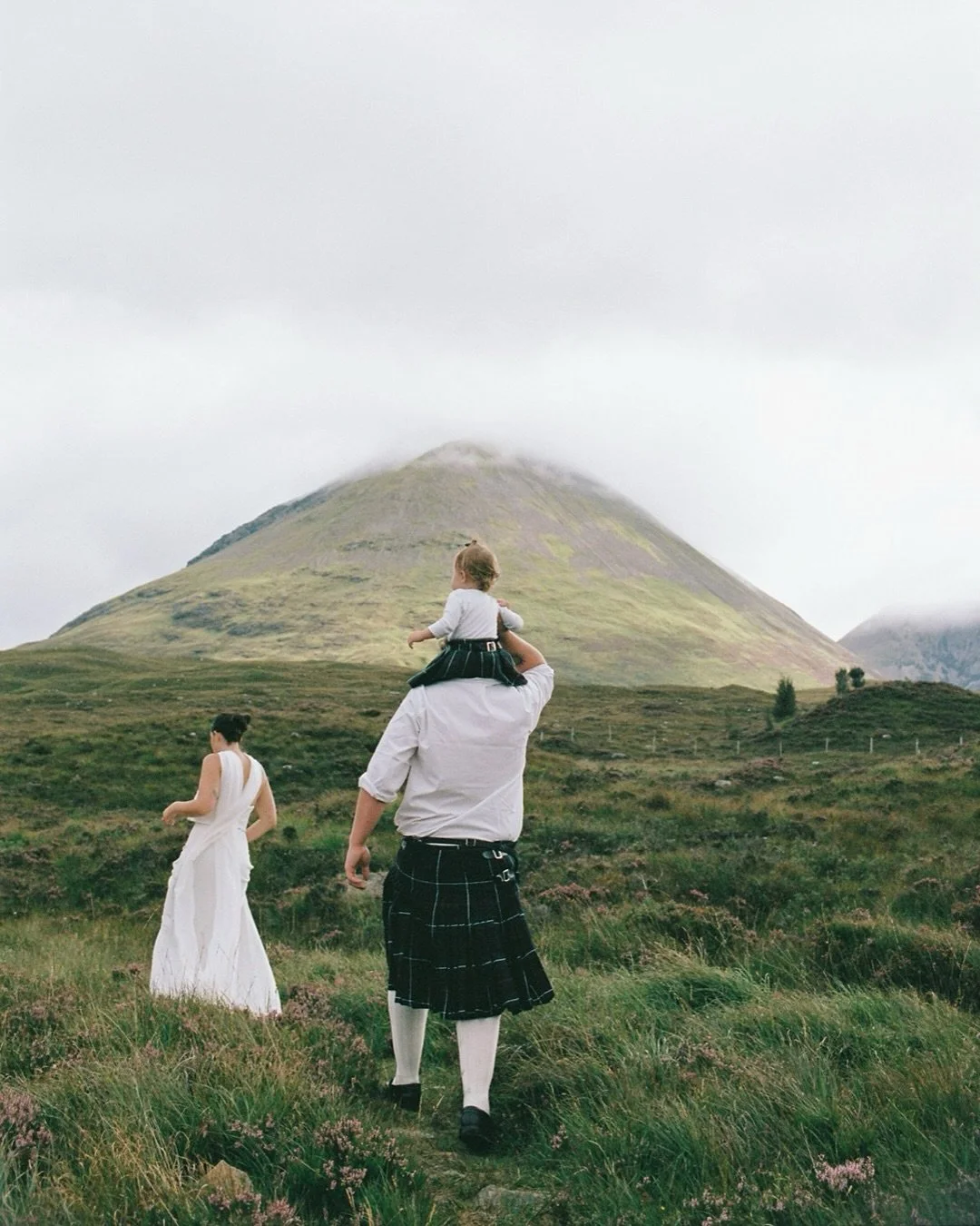 C + B 

~ everything on analogue ~ 

all the way from Canada to the misty Isle of Skye to celebrate their love

they read their handwritten vows to one another, surrounded by heather, cloud + quiet, with their sweet daughter by their side &mdash; the