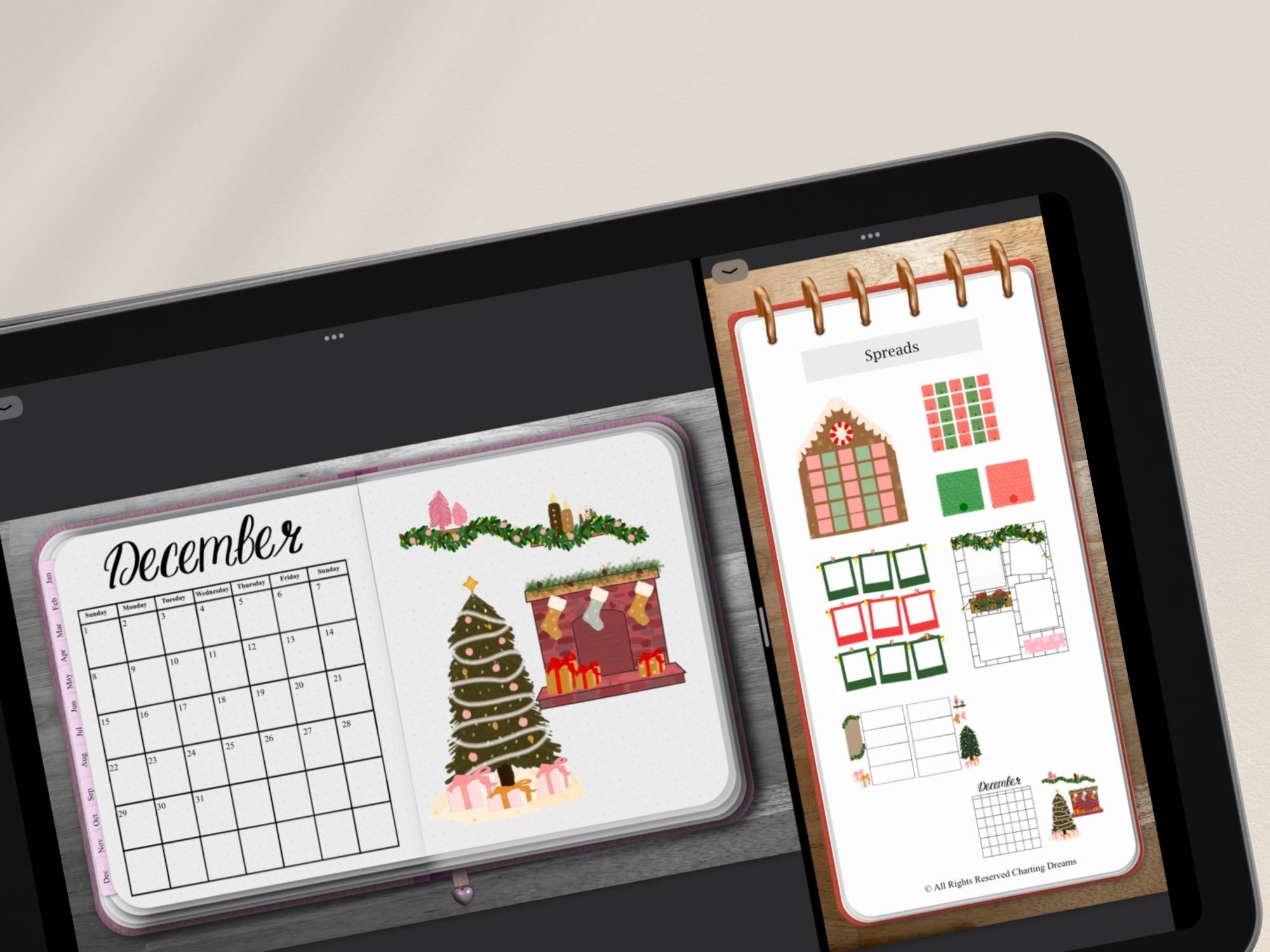 Digital planner December calendar page with Christmas-themed digital stickers displayed on a tablet screen.