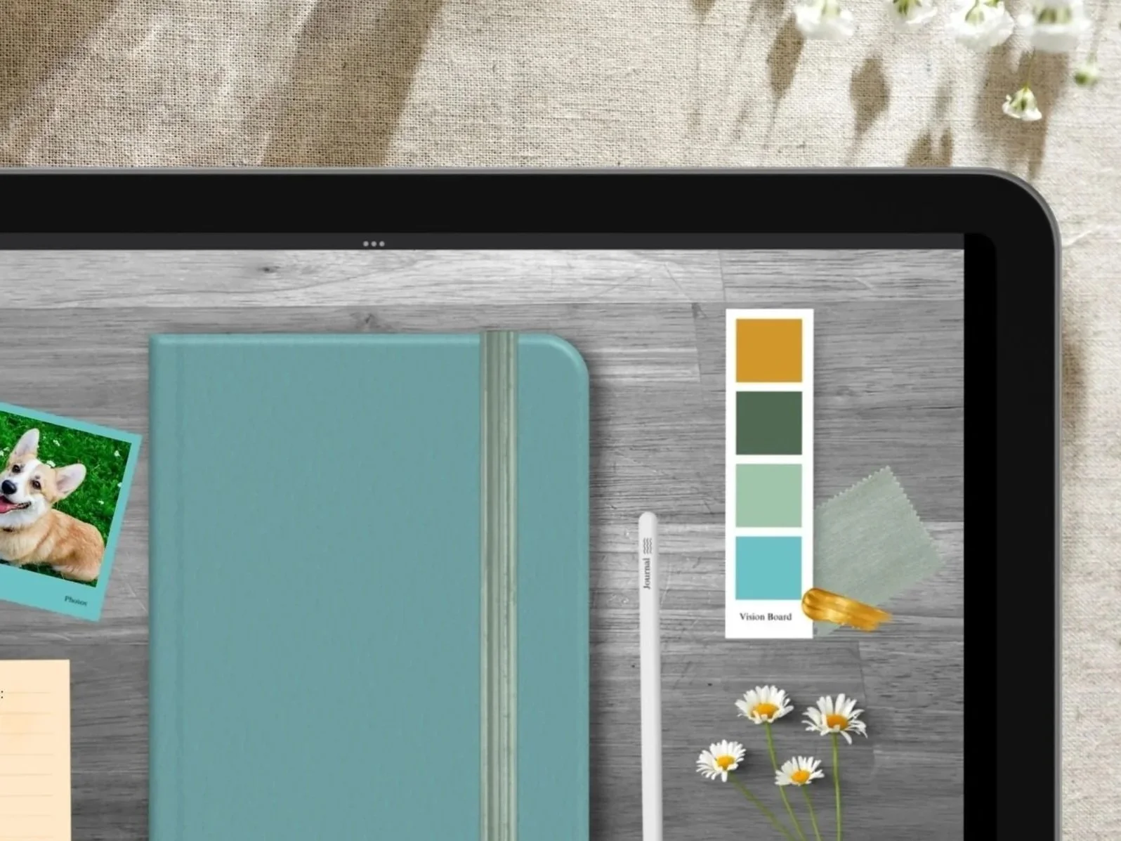 Digital journal banner with polaroid photos, an elastic-band notebook, color swatches,