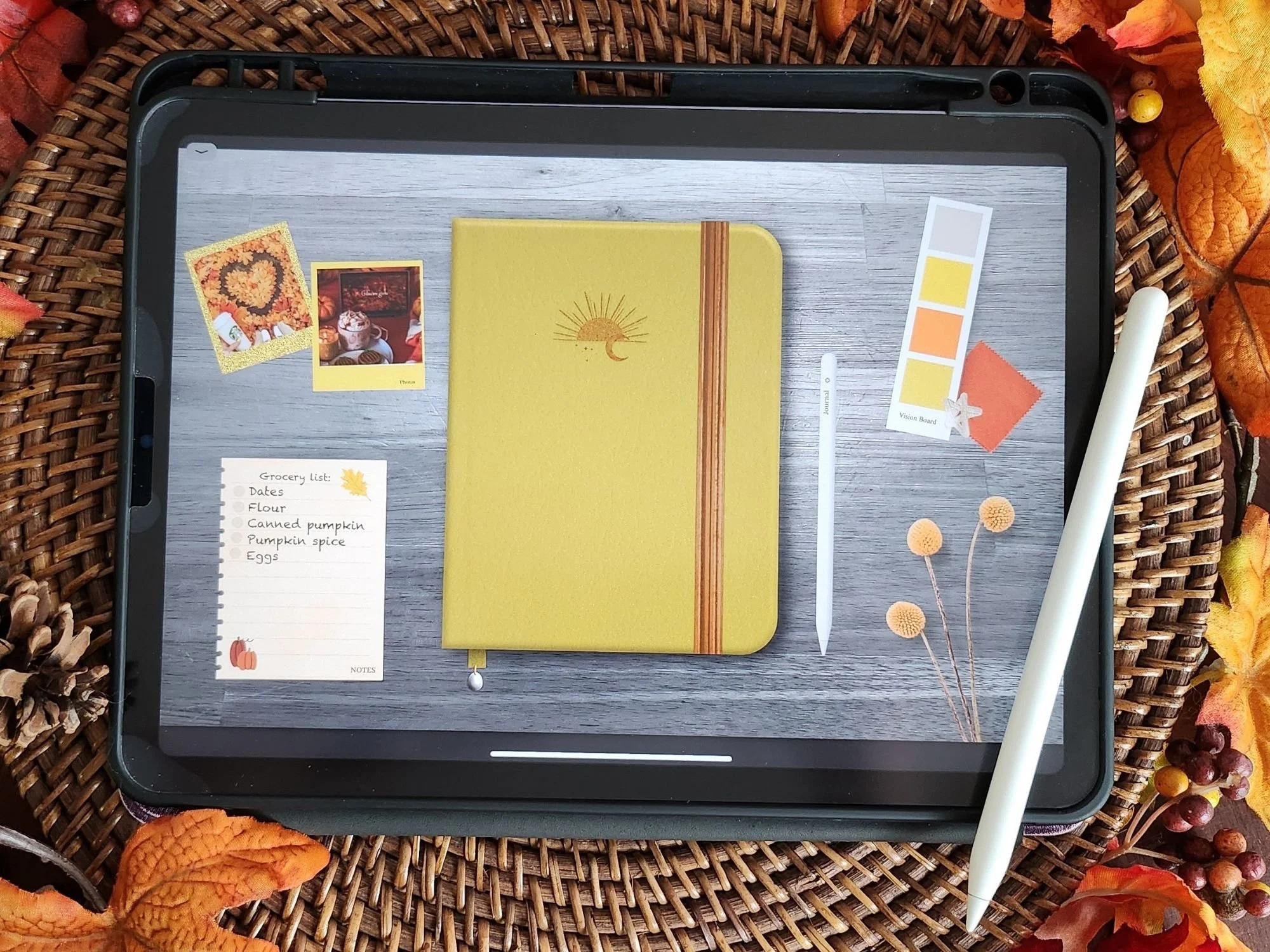 Yellow digital journal on an ipad with fall leaves surrounding it