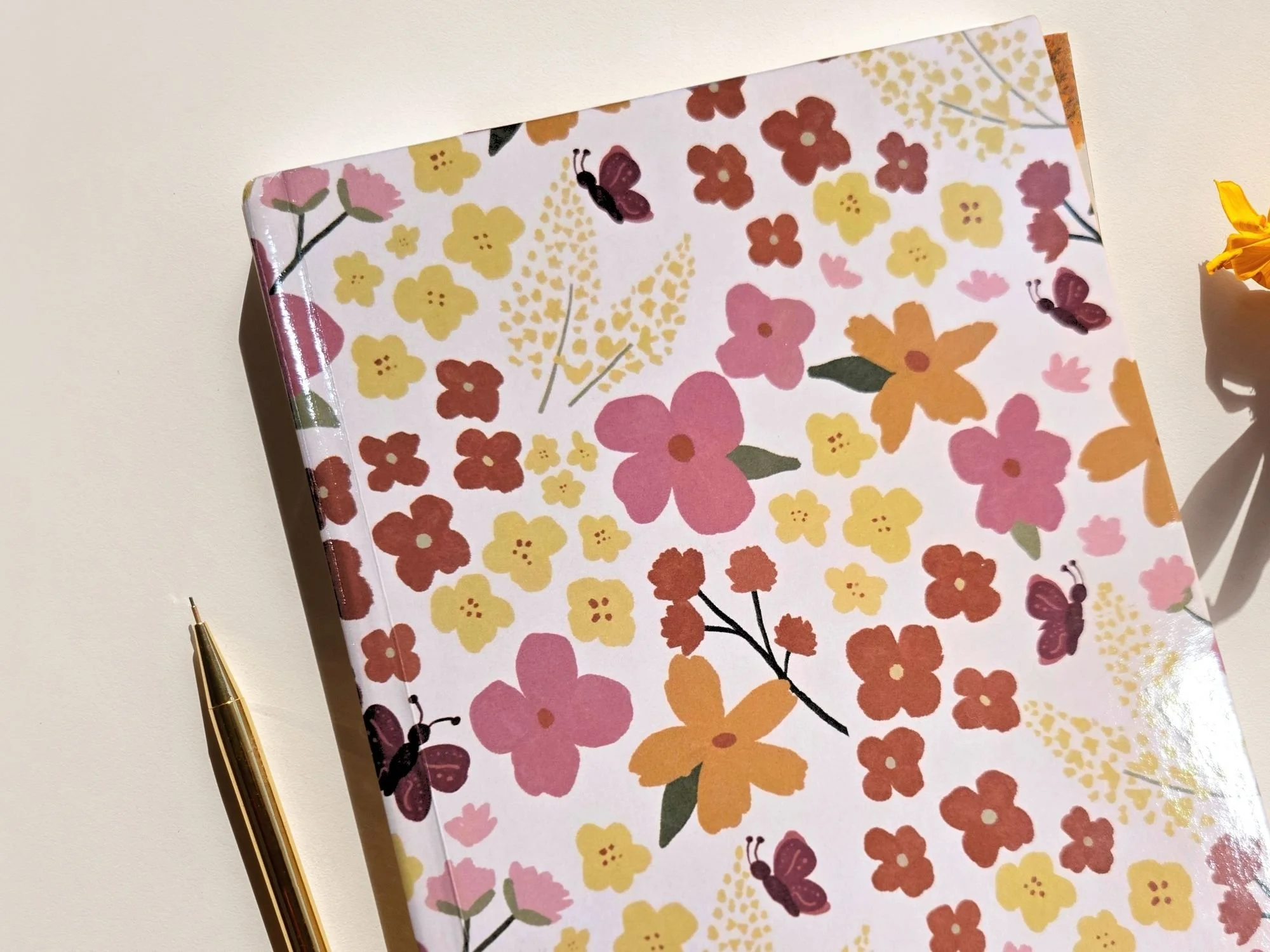 Bright floral journal with butterflies and florals for a body positive food approach