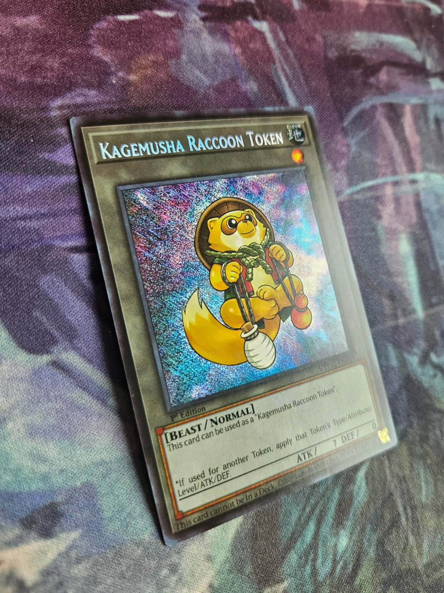 Summoned by the effect of Number 64: Ronin Raccoon Sandayu.

Today's showcase is a change of pace and features a custom made token for a Rank 2 XYZ monster from a simpler era which likely still sees some play in older formats. This raccoon is feature