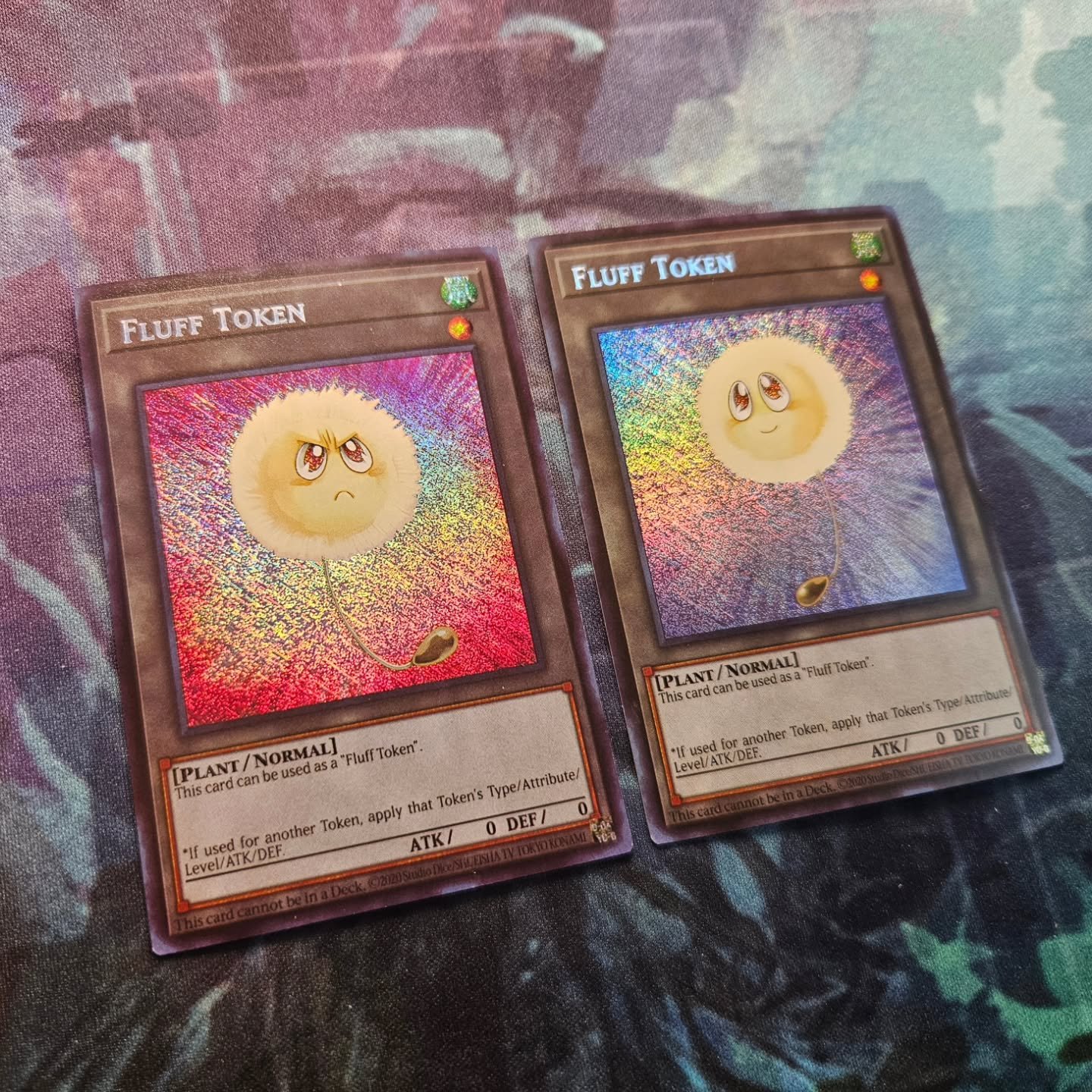 Whether you're happy or angry...Tokens are a great way to add some flair to your favorite deck. Our secret rare Fluff tokens are some of our most popular and really add some flash to those retro format decks playing Dandy.

Check out our full portfol