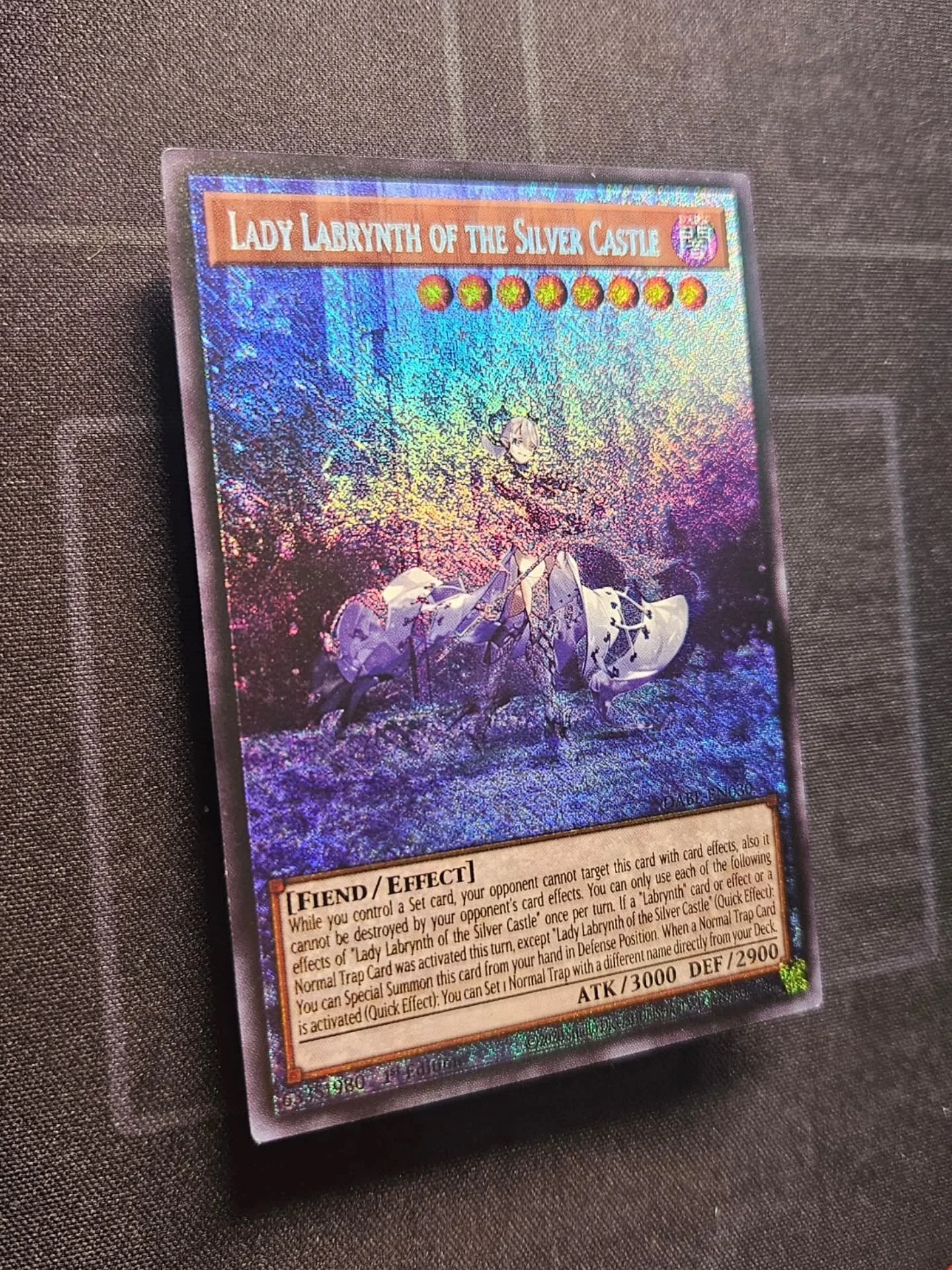 Lady Labrynth Extended Art. The key piece of another powerful archetype known for controlling the duel until the opponent runs out of resources.

The card frame was removed in favor of building out the silver castle behind Lady Labrynth.

Day 3/10 of