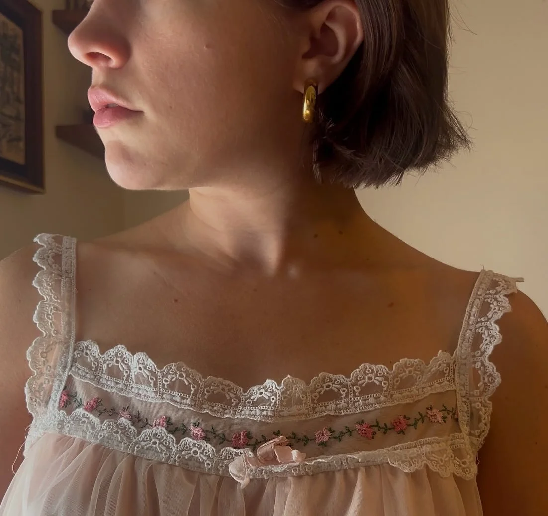 1960s women's nightwear was just as much about elegance as it was comfort. Designed to be worn in the evening at home while lounging with a novel in hand or brushing out curls just before bed. The delicate flow and romantic details feel just as relev