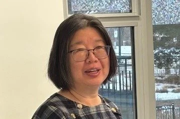 Min Zhu, resident care manager