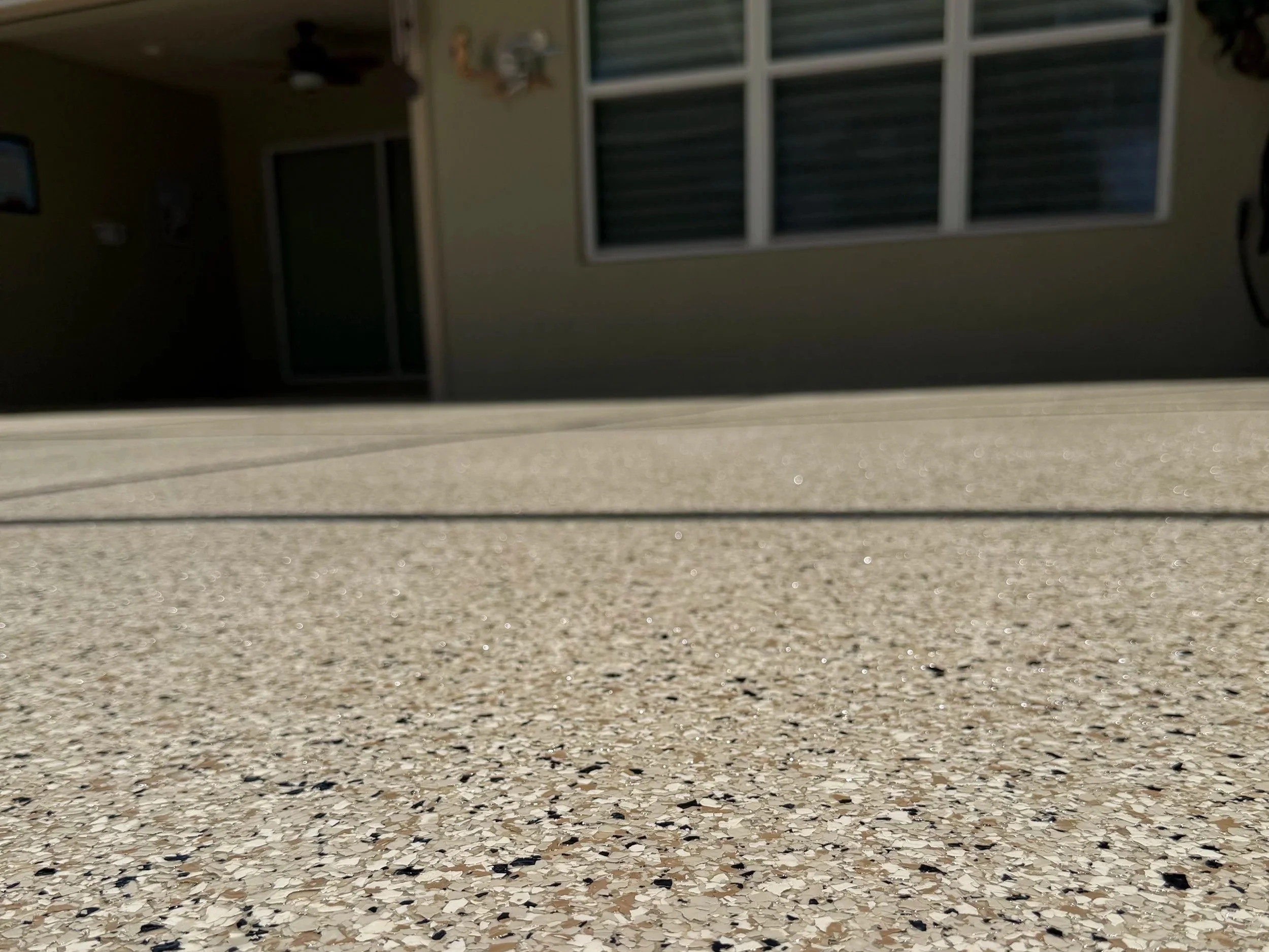 Lanai Refinished with epoxy and polyaspartic flake coating in Englewood FL