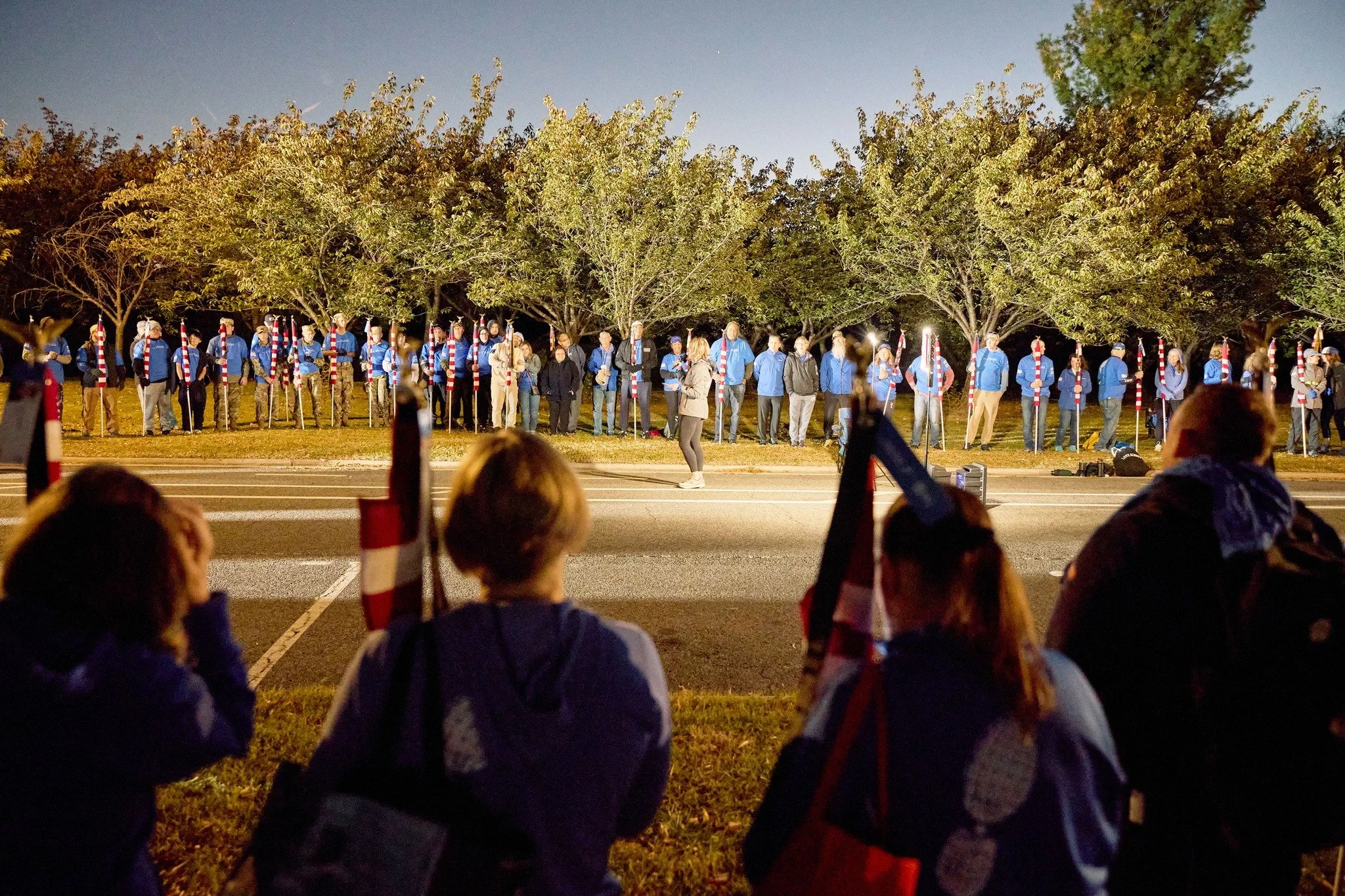 Before the crowds gather, you stand in quiet, powerful remembrance.

To our volunteers,

You show up before the sun rises. You hold the flags with care.
You honor every fallen service member along the wear blue Mile.

You show up for others. You carr