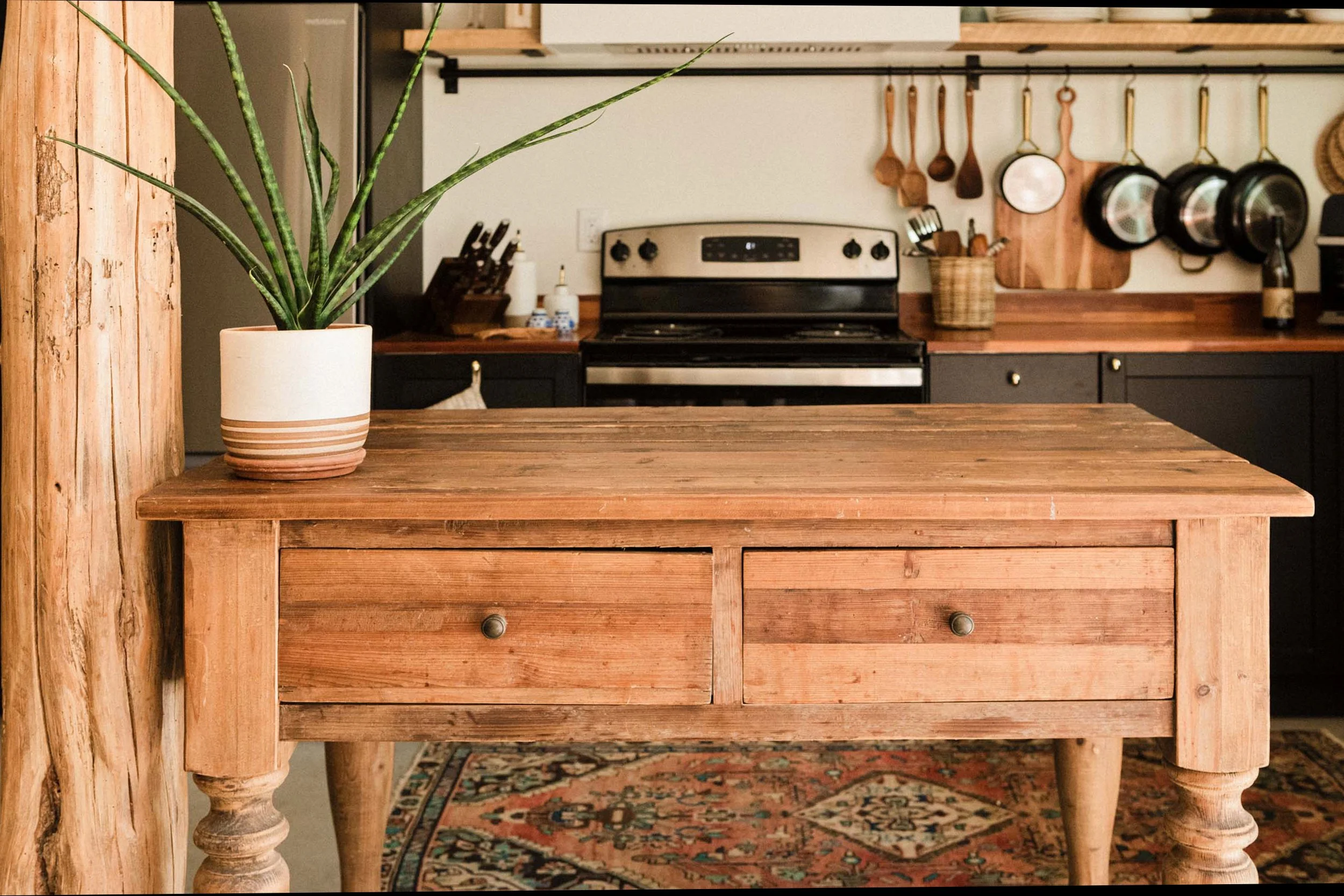Professional interior photography of a vintage wood kitchen island.