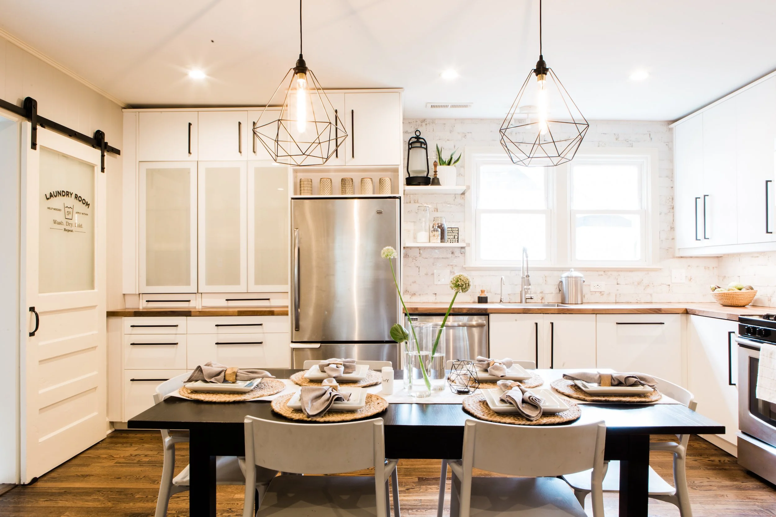 Bright Scandinavian kitchen photography featuring geometric light fixtures.