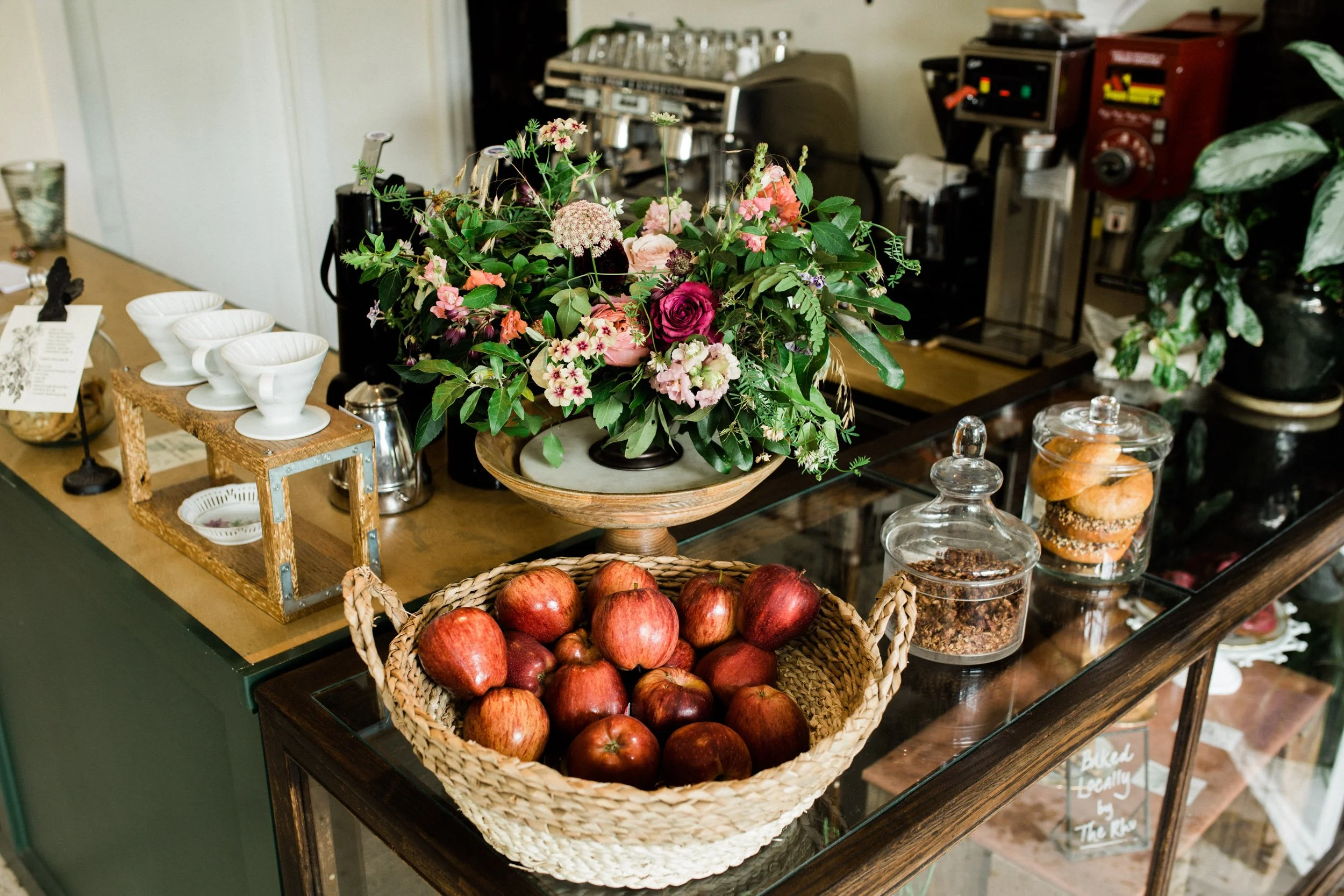 Branding Shot of Apples on the coffee counter at Forage in Asheviile