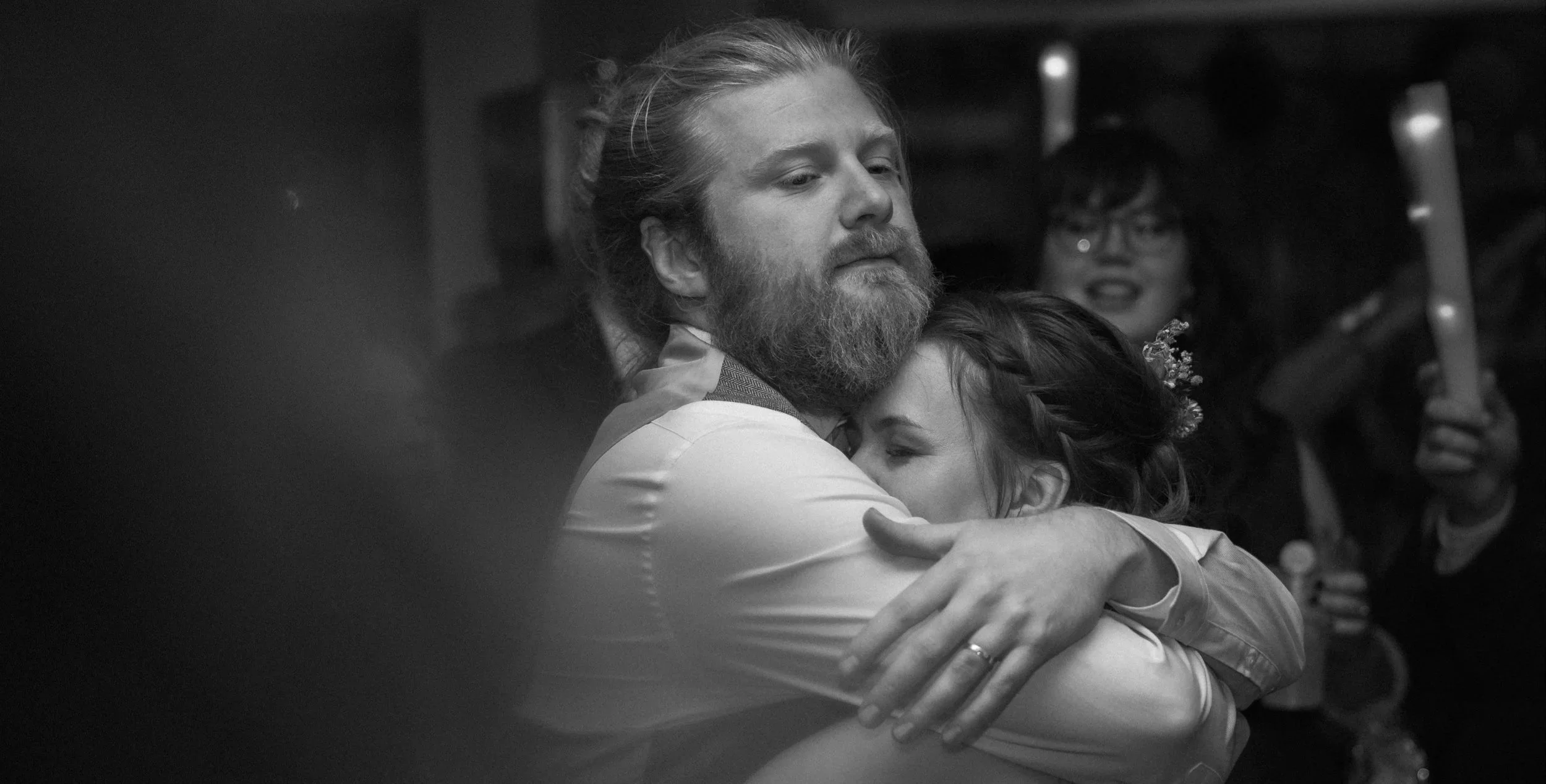Black and white photograph of a couple on their wedding day by Harry Bradley Photo