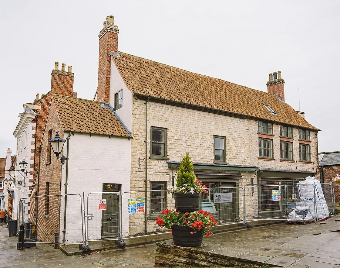 A historic building in Malton marketplace under construction with Yorkshire builders York Property Solutions
